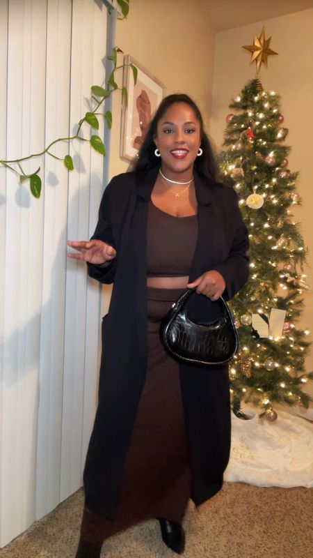 Easy matching set for a holiday party 🎄✨ 

The top is a large and the skirt is an XL. I always go I’m a half size in Marc fisher boots  

#LTKstyletip #LTKSeasonal #LTKHoliday