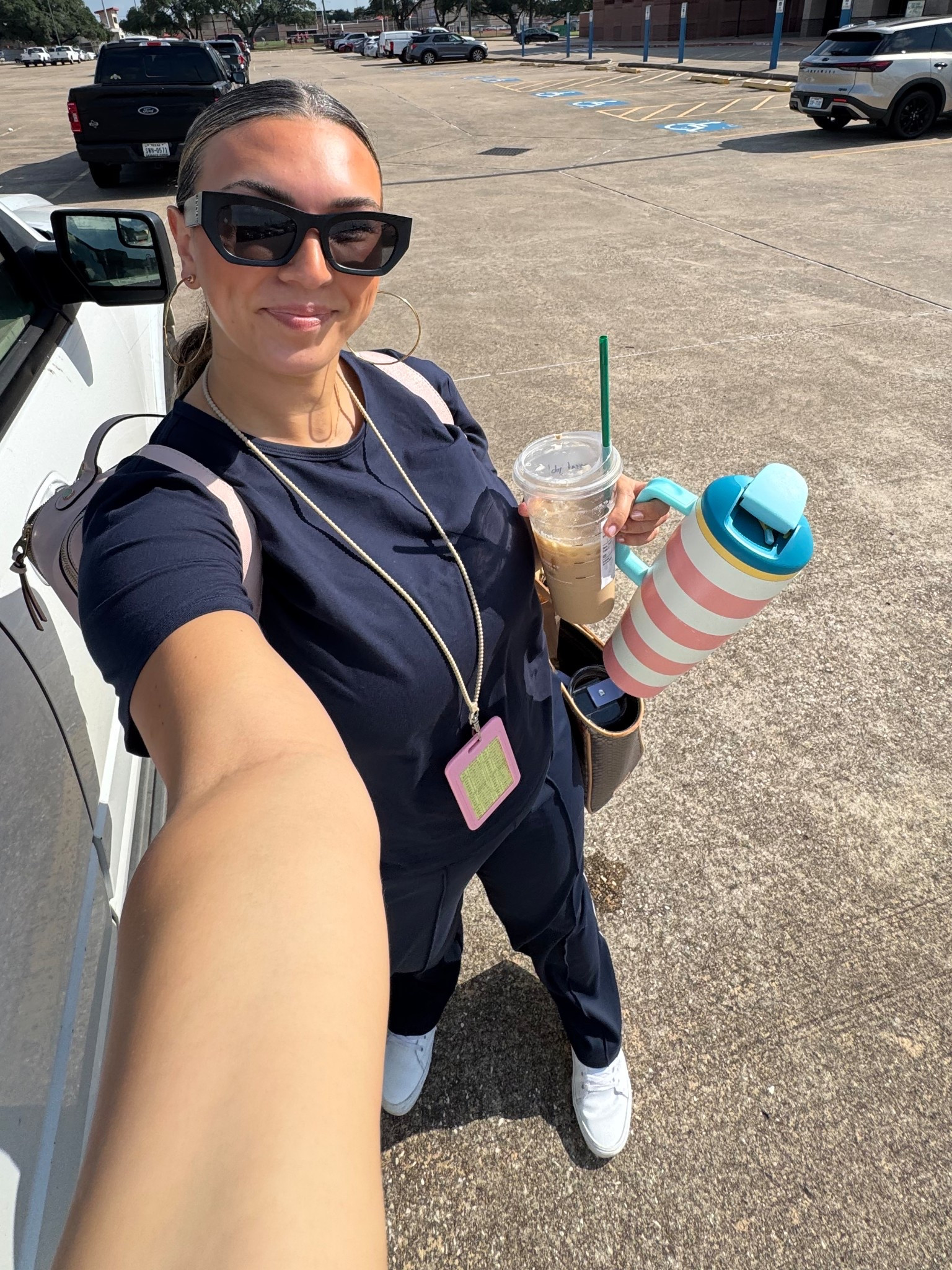 Work outfit 💙

Athleta pants and essential tee 
Lanyard 
White vans 
Amazon sunglasses 
Work backpack 
Owala
Gold hoops 

#LTKWorkwear #LTKFindsUnder100 #LTKMidsize