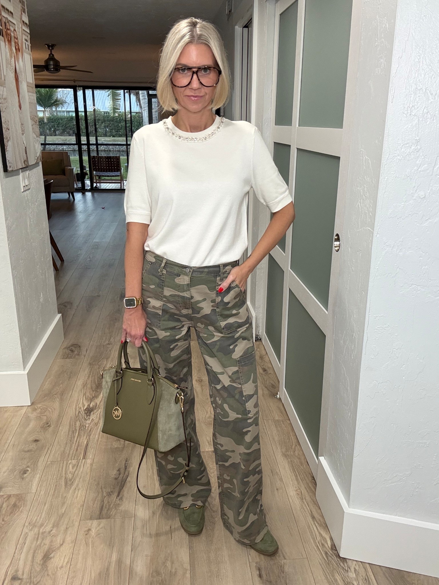 The juxtaposition is just 🤌🏼

Pearls and camo?! 
Yes ma’am! 

This sweater is from Arach & Cloz found on Amazon. The pearl embellished detail at the collar adds an elevated touch that you can easier dress up or down. I’m wearing a medium, but could easily size down one. 

My camo pants are from Walmart. They’re lightweight, comfortable and ridiculously affordable. I’m wearing a small. 

My loafers are also from Walmart and they fit tts. 