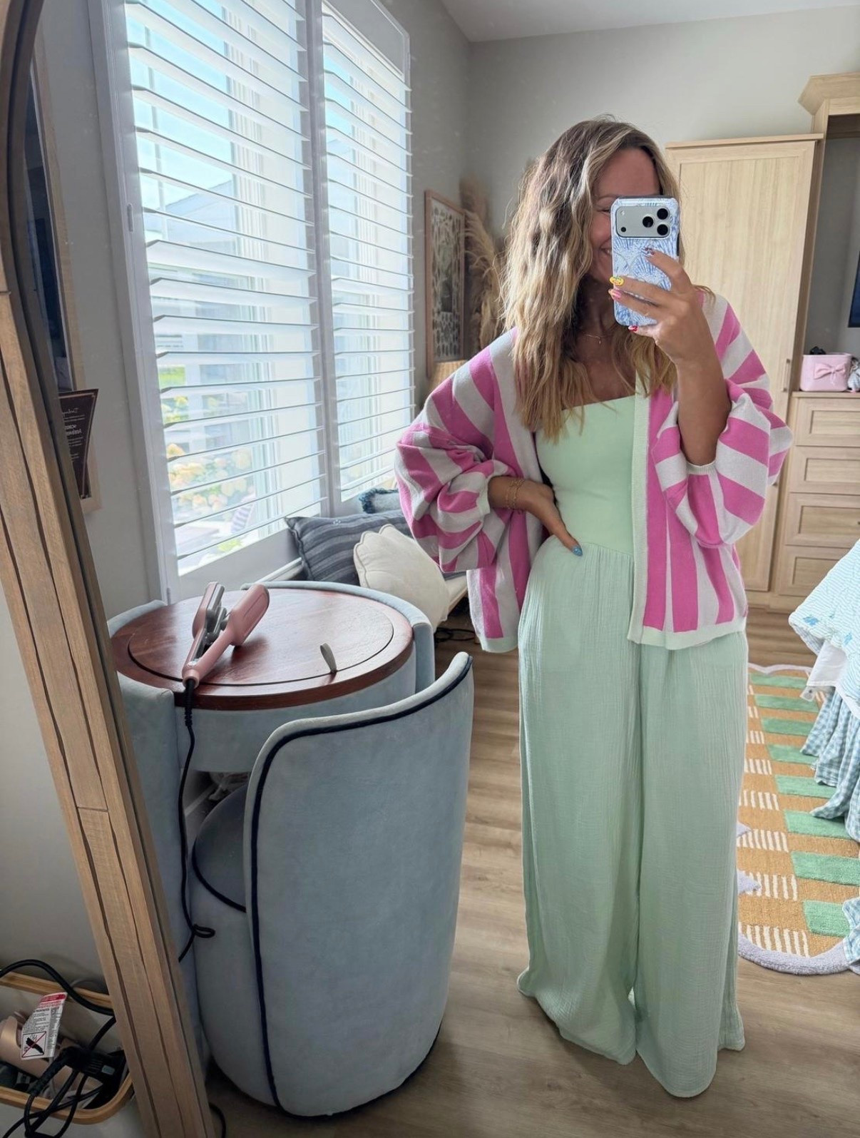 This color combo deserves its own moment. 💗🍃 The mint jumpsuit is lightweight, flowy, and so flattering, and the pink striped cardigan is the perfect layer for chilly restaurants, travel days, or transitioning into fall. One of those outfits that looks like you put in way more effort than you did.

mint jumpsuit, wide leg jumpsuit, pink cardigan, striped cardigan, travel outfit, vacation outfit, resort wear, lightweight layers, casual chic, brunch outfit, summer to fall outfit, comfy outfit, everyday style.