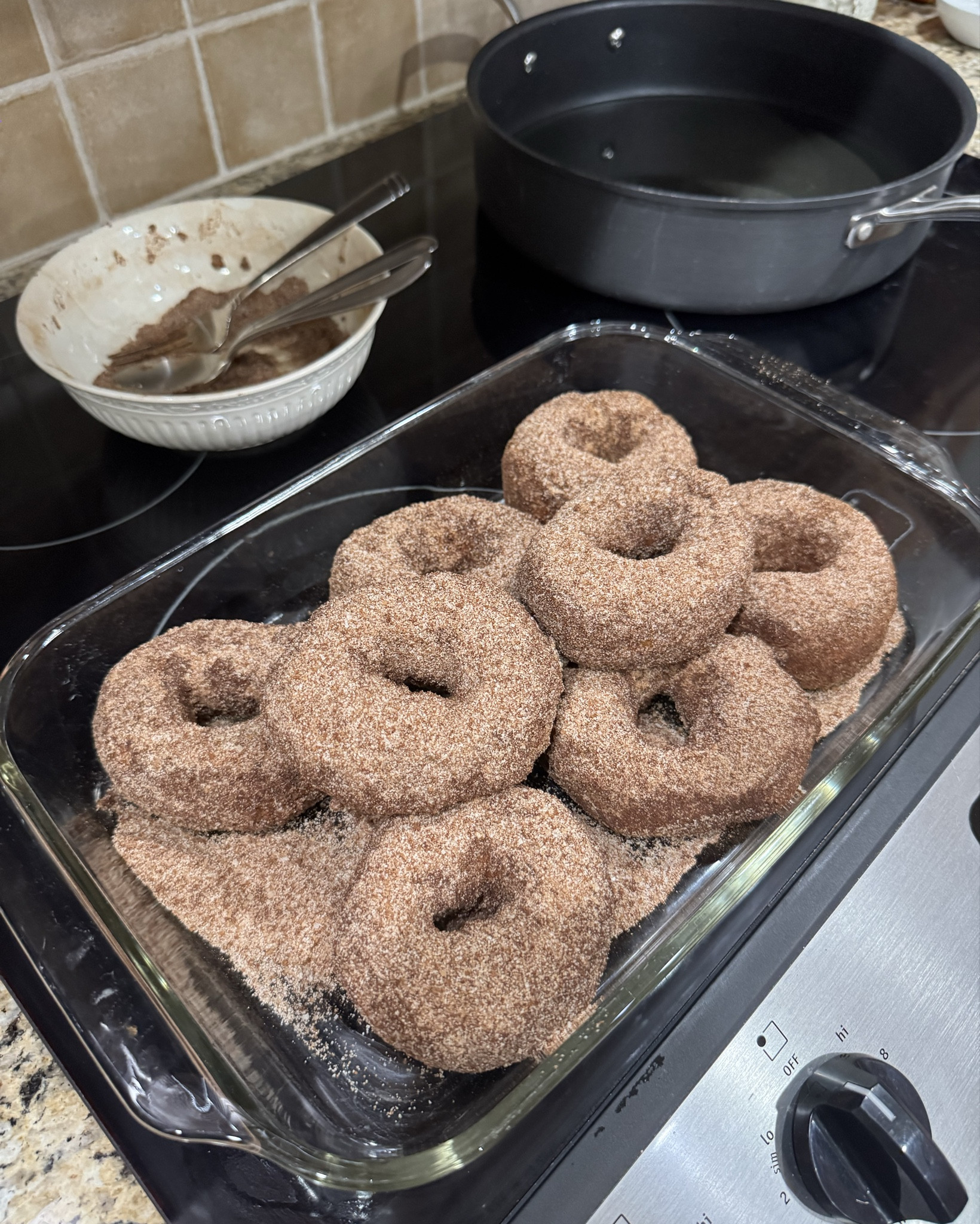 Made some donuts with my youngest son, Gunner tonight 🫶

This is how I used to make donuts with my mama when I was a little girl so this was very nostalgic for me getting to do with Gunner. Idk why it’s taken me this long to actually make these with him 🙃 

They’re super easy to make and delicious 🤤 

Recipie:
Pillsbury can of biscuits - poke a hole and morph into the donut shape
Vegetable oil (about and inch or two in a skillet or pot) 
When oil hot place biscuits in pan, then after a few minutes flip and get the other side
While it’s frying make the cinnamon sugar mixture. 
I didn’t measure this mixture but I would say a cup or so of sugar then about a 1/4 c cinnamon. (Add more to your discretion, we love cinnamon so we added more) 
As soon as both sides are toasted, immediately drop donut into the cinnamon sugar mixture & coat both sides. Once coated let cool for about 10 mins or so. 
Repeat with all the biscuit/donuts. 
Good luck trying to eat just one 🤗

#LTKHome #LTKfoodie #LTKmomlife