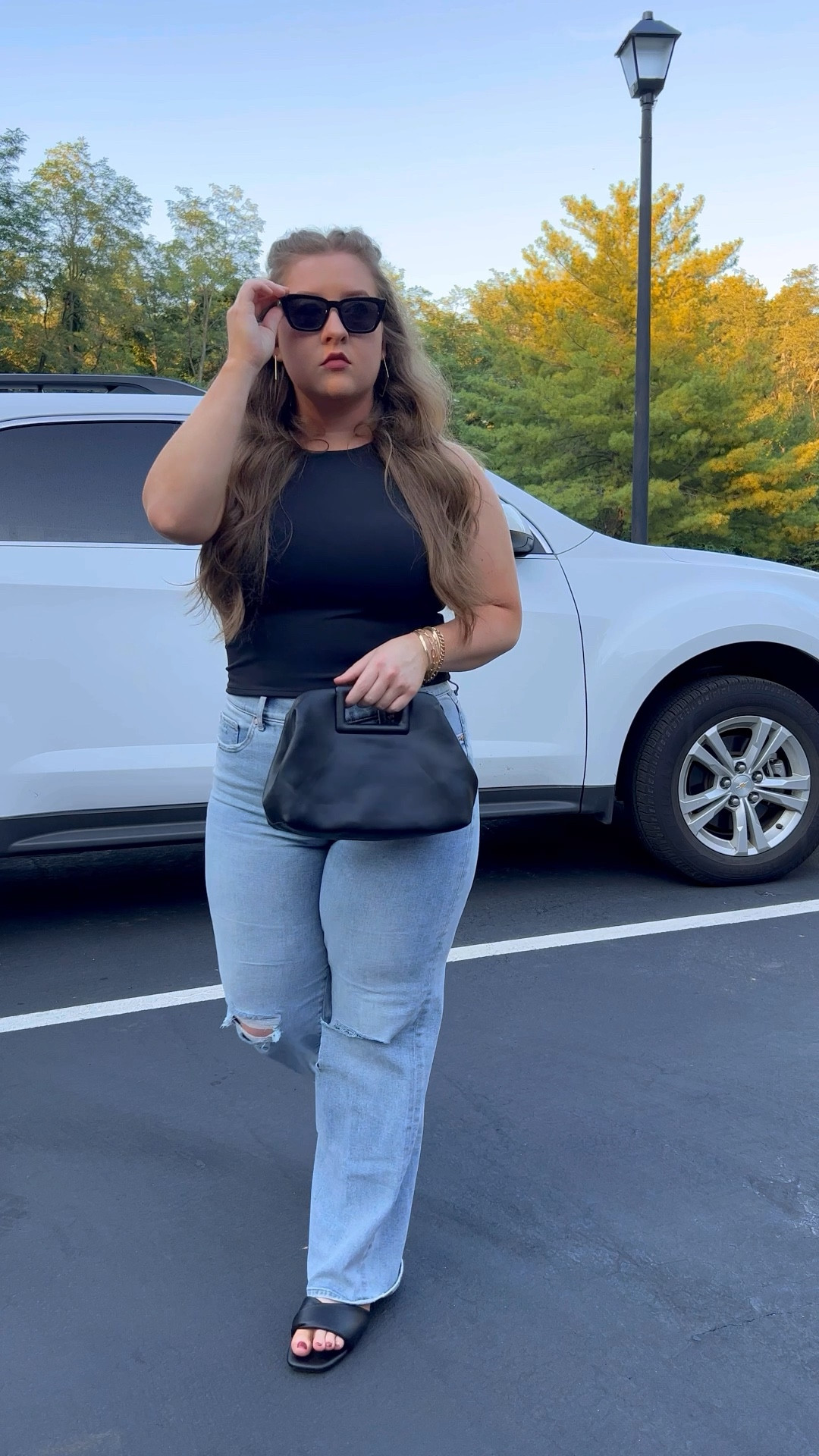 My whole outfit is on major sale at Express! High neck cropped tank, wide leg jeans, black sandals, it’s all on sale! 

#LTKsalealert #LTKunder50 #LTKcurves