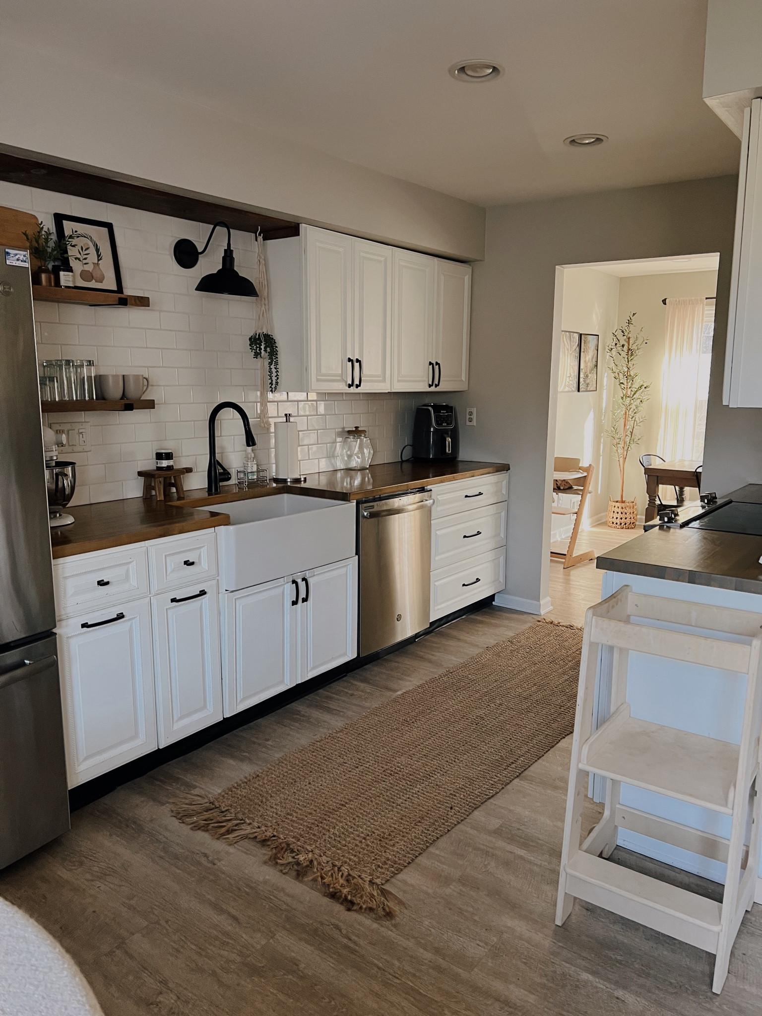 Galley kitchen // boho kitchen // small kitchen // kitchen decor // kitchen runner // white kitchen cabinets // backsplash 

#LTKfindsunder100 #LTKsalealert #LTKhome