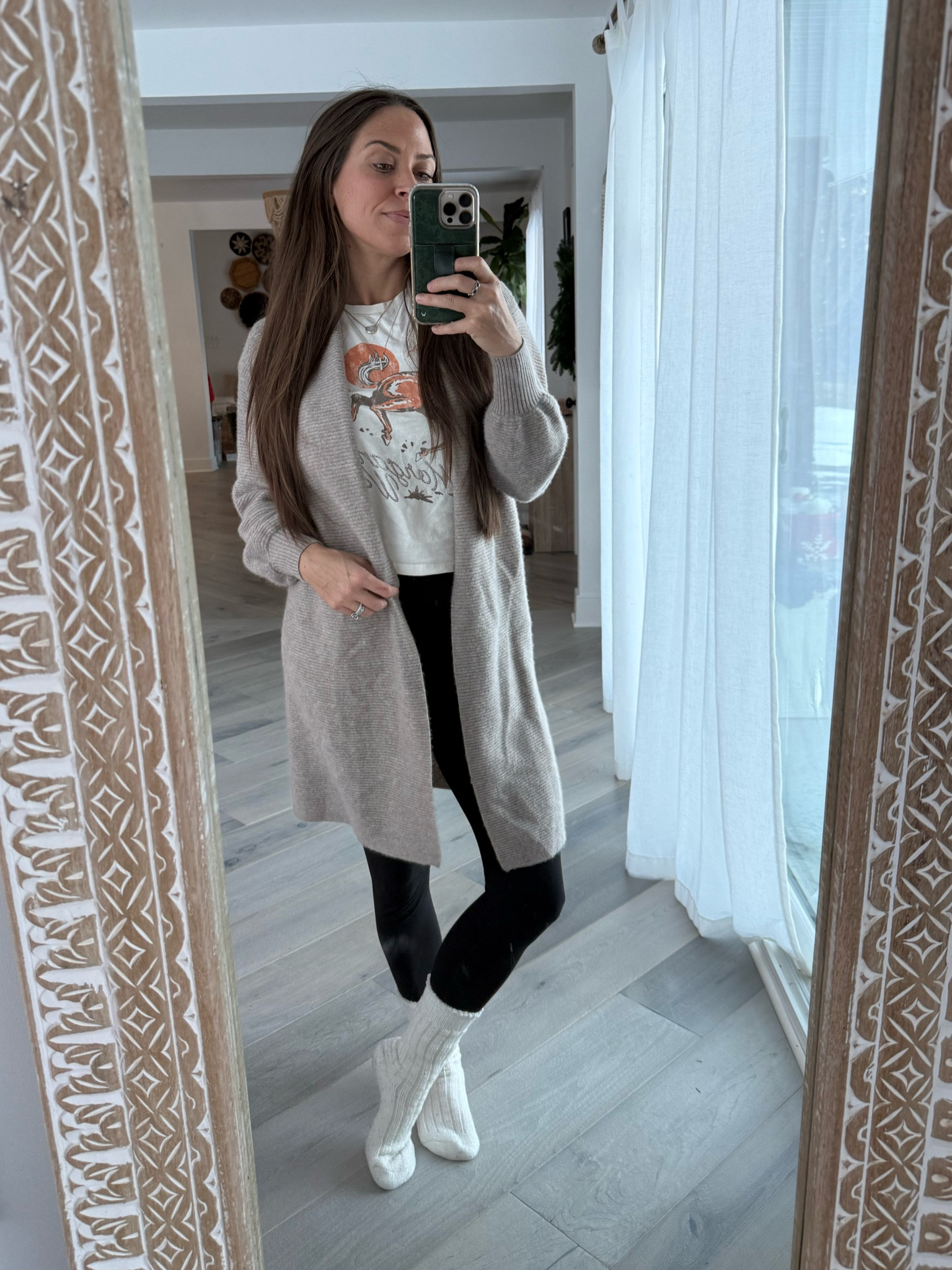 Cozy SAHM winter outfit! Cardigan, graphic tee, lulu lemon dupe leggings (SO SOFT!), and cozy socks. 

Leggings are exact, everything else is similar. 

Cozy sahm outfits | cozy winter outfit | sahm outfits 

#LTKStyleTip #LTKFindsUnder50 #LTKActive
