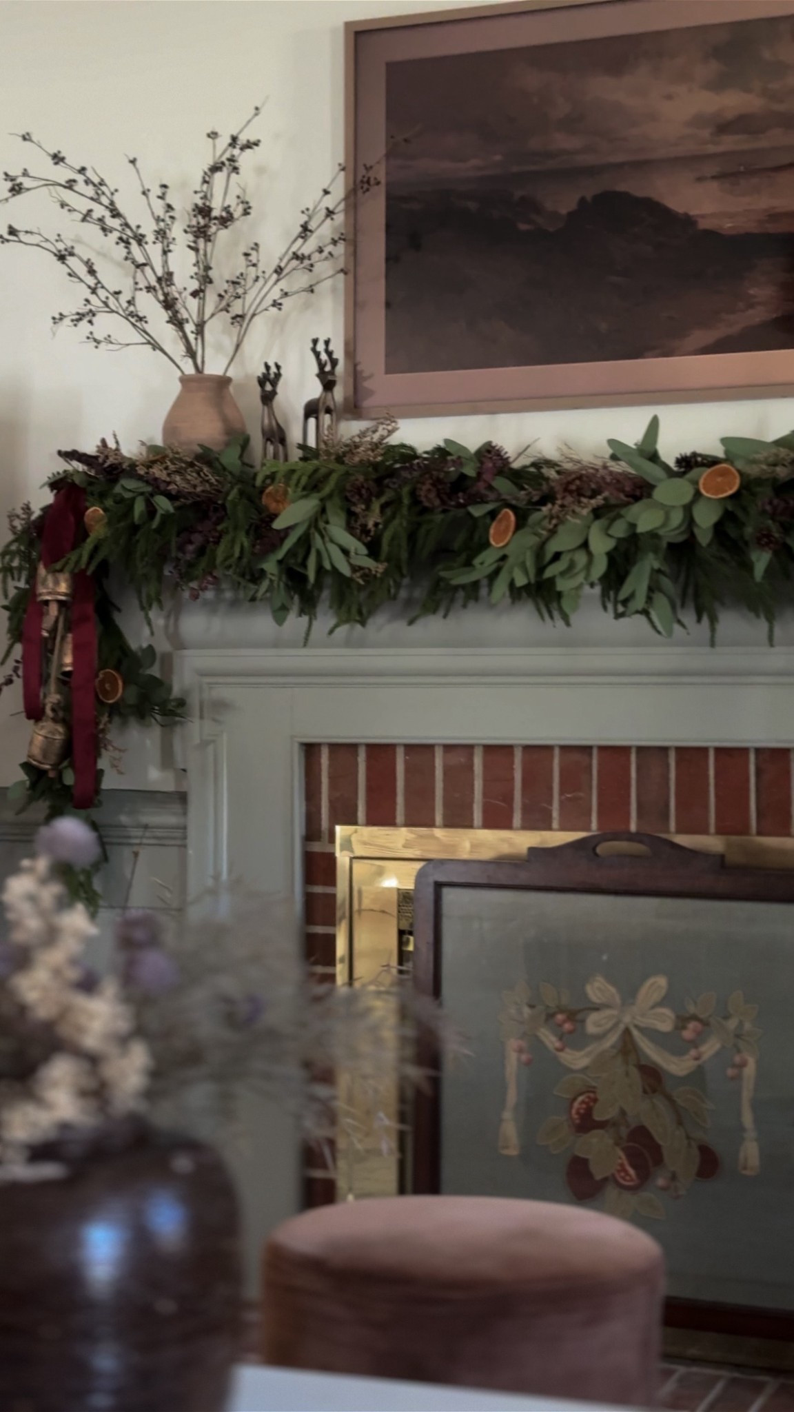 Moody warm sophisticated holiday mantel