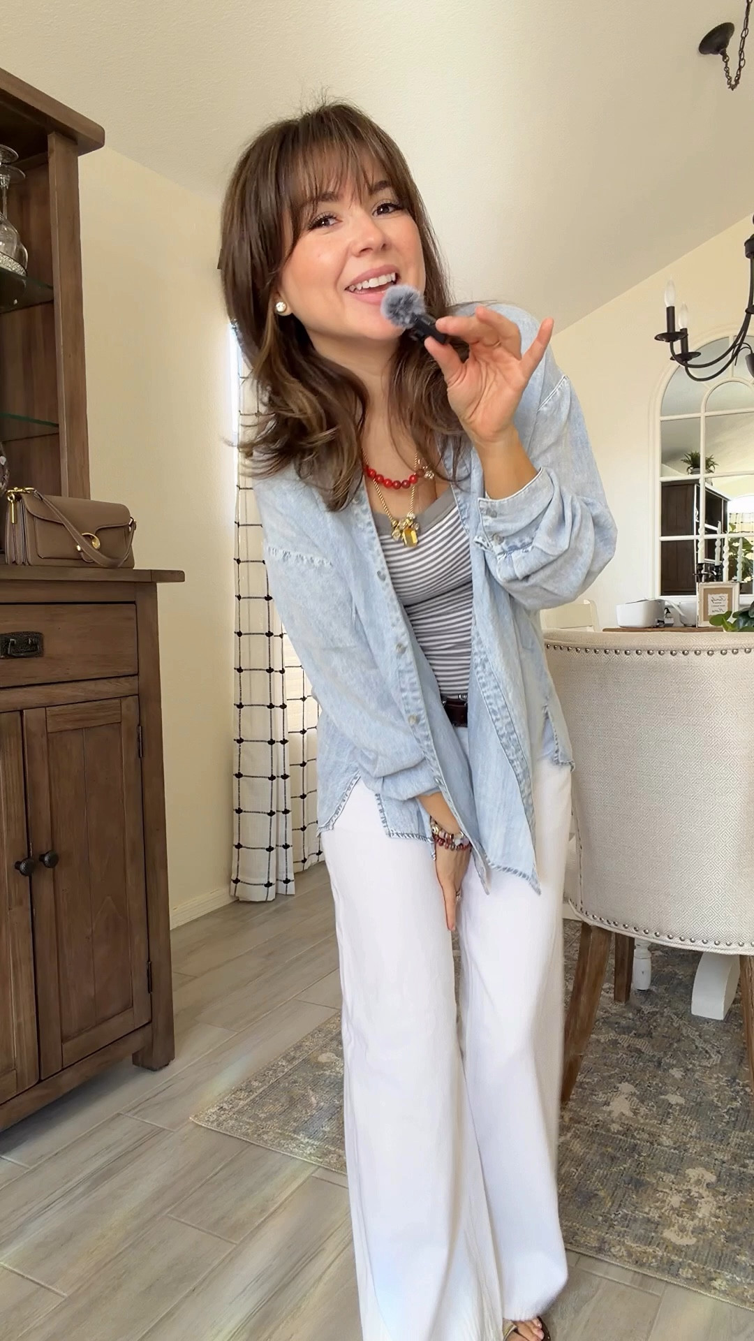 What I’m wearing today as a 5’2 petite mom—easy, elevated, and actually wearable.

This outfit is one of those low-effort combinations that still feels put together. The wide leg pants are petite-friendly (no dragging, no tailoring), and pairing them with a fitted striped tank keeps everything balanced so it doesn’t overwhelm a shorter frame. The lightweight chambray layer makes it feel styled without adding bulk.

Finished it off with simple sandals and a neutral crossbody for an everyday look that works for errands, lunch, or just feeling like yourself again.

petite outfit, 5’2 style, petite wide leg pants, mom outfits, everyday outfit ideas, casual chic

Tank XS 
Top XS 
Jeans 00short 
Sandals 5 


Comment SHOP below to receive a DM with the link to this post on my LTK ⬇ https://liketk.it/633fG #ltkgrwm #ltkfestival #ltkpetite

