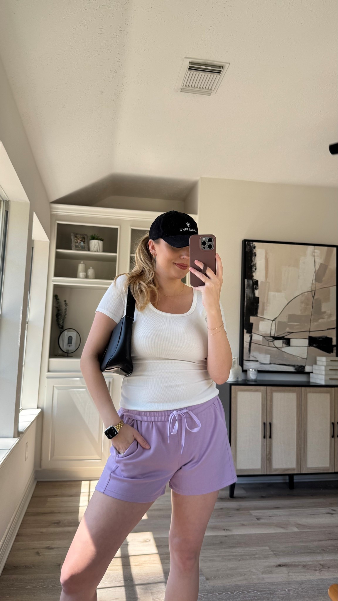 Athleisure Spring Outfit | I love these lounge shorts. So comfortable and come in several colors. Wearing size L in the shorts, M in the white top. Sandals fit tts.

#LTKStyleTip