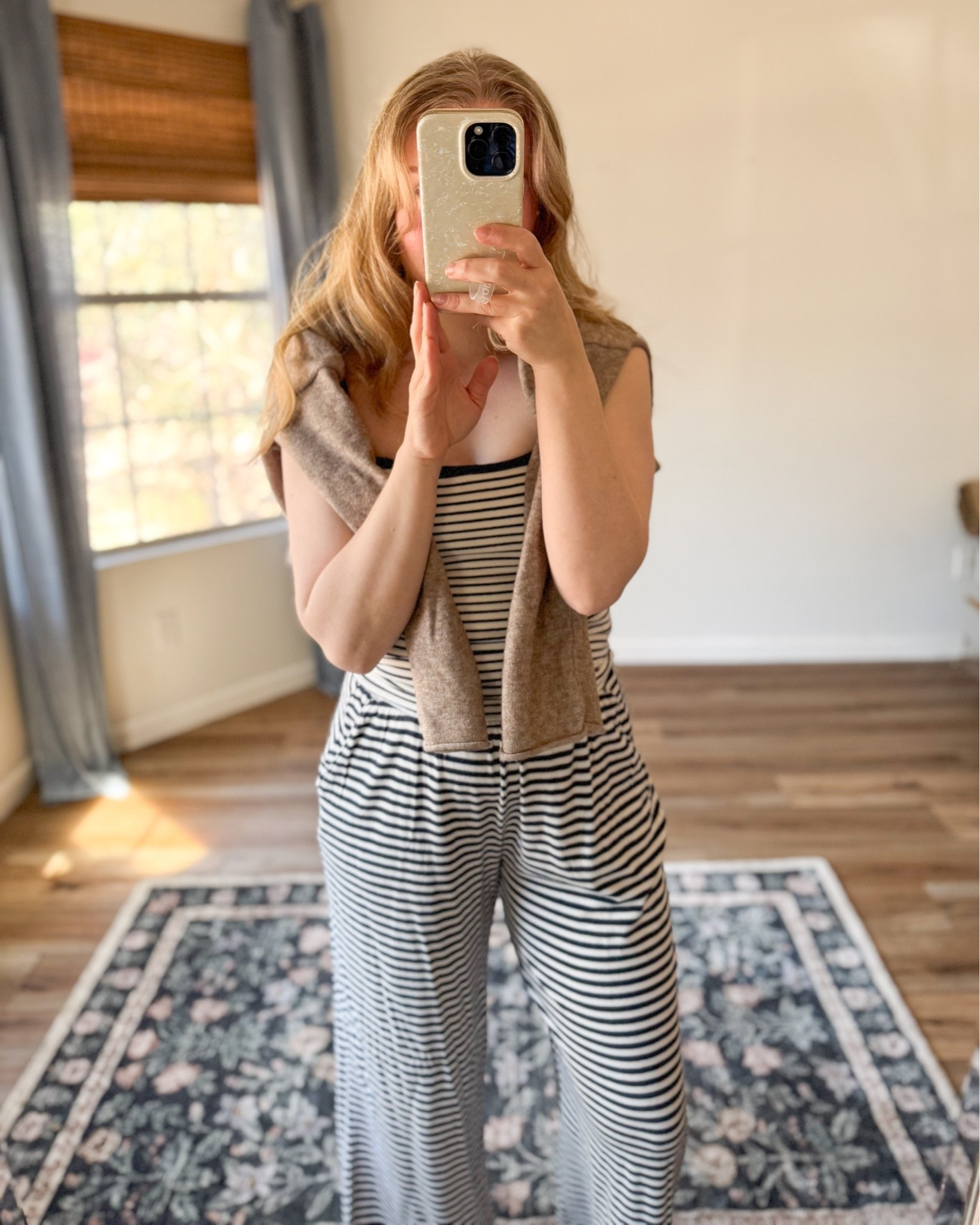 abercrombie lounge wear Current favorite lounge combo 🤍 Striped soft pants + the matching 90s bra-free cami from Abercrombie, finished with a cozy taupe cardigan draped over the shoulders. The kind of outfit that feels like pajamas but looks put together ✨ #LTKStyleTip #aberc

#LTKxAbercrombie