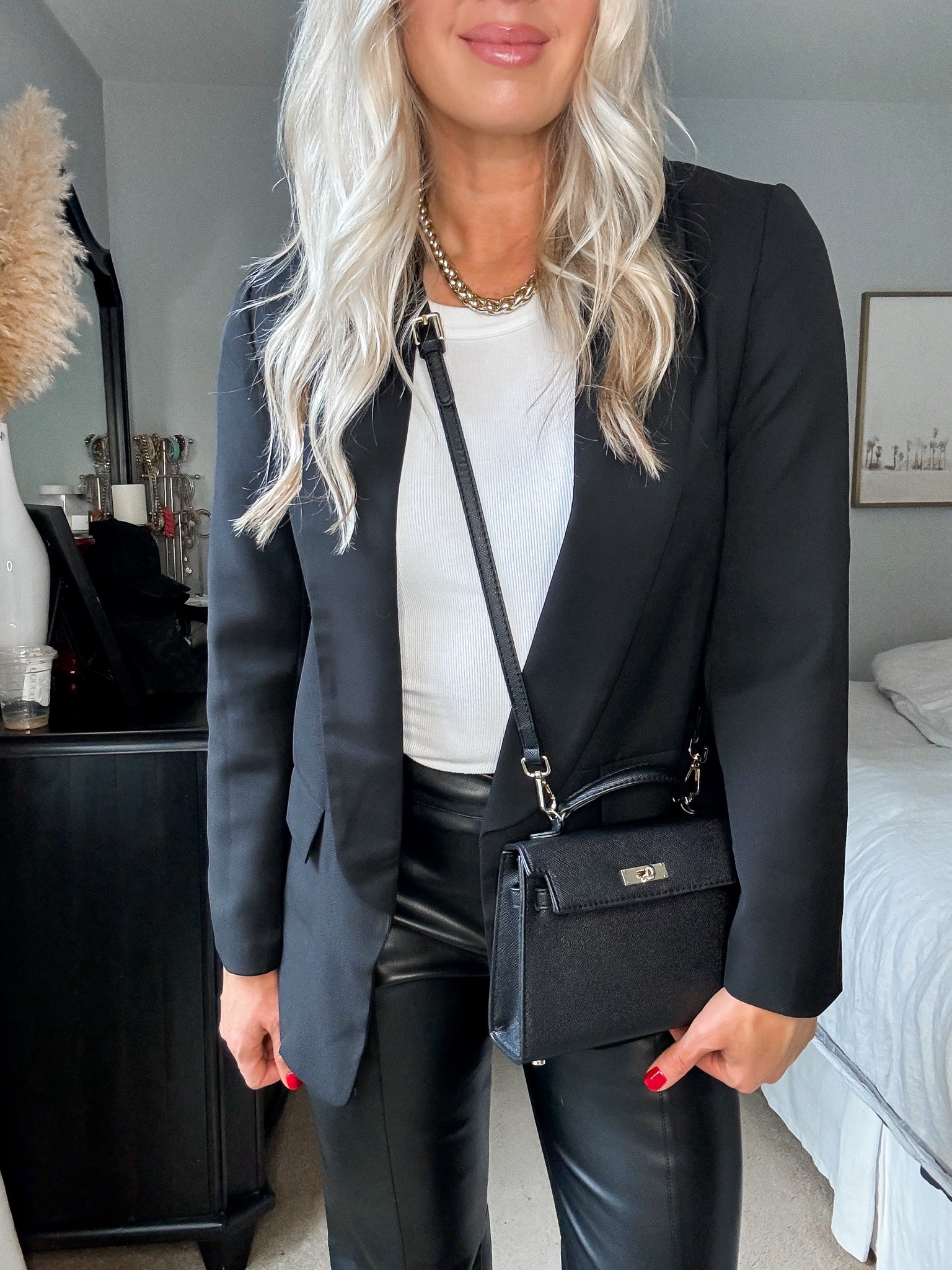 Amazon blazer 
Amazon bag 
Faux leather pants under $100 (true to size) 
Christmas party outfit 

#LTKfindsunder50 #LTKSeasonal #LTKHoliday