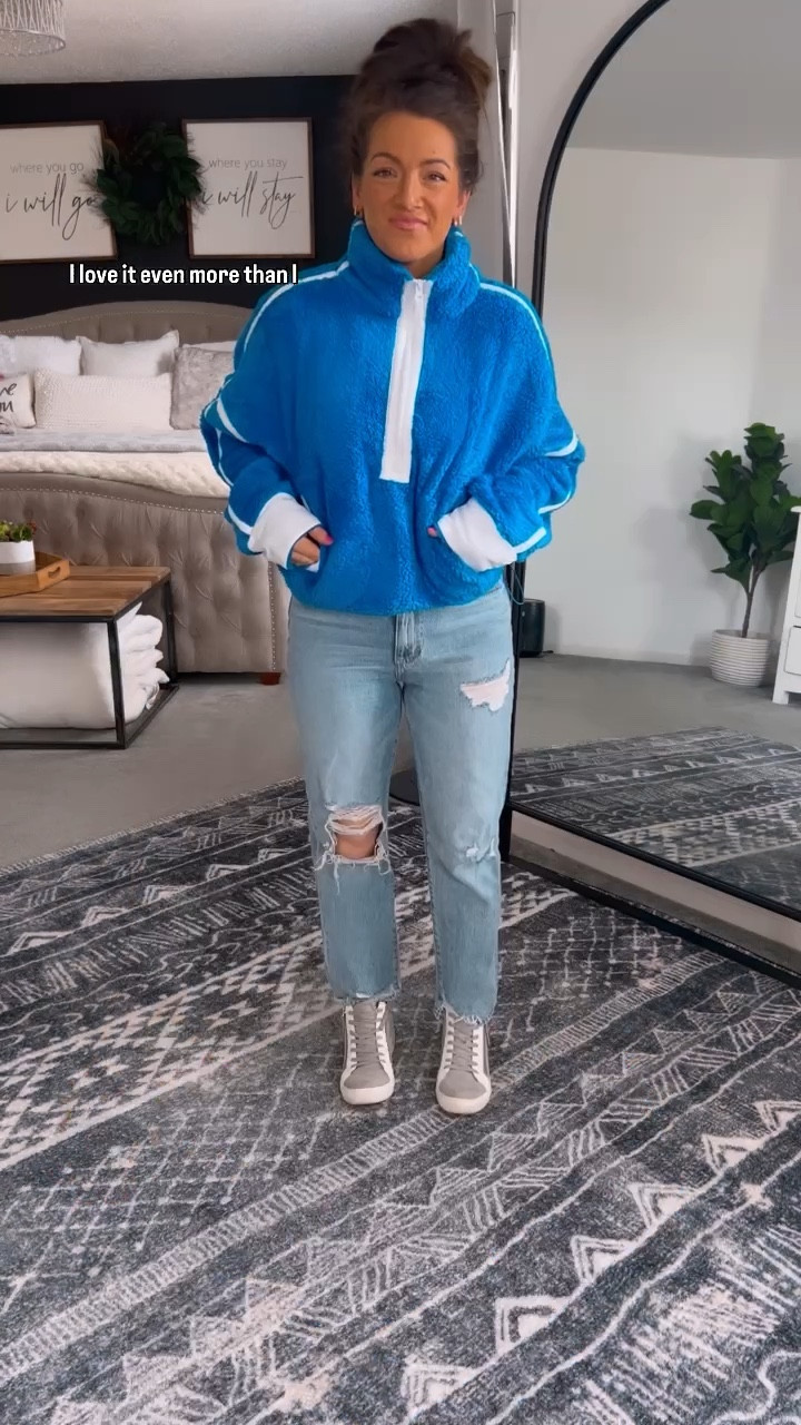 This Amazon fleece is so good!! I love the bright blue and it’s so soft/comfy!! Comes in other colors with a clickable coupon too! Runs perfectly oversized and has the side bungee to cinch for a crop fit. Jeans are on major markdown, but limited size. Exact Levi’s are oos, but I linked 2 similar options! 

#LTKstyletip #LTKsalealert #LTKVideo