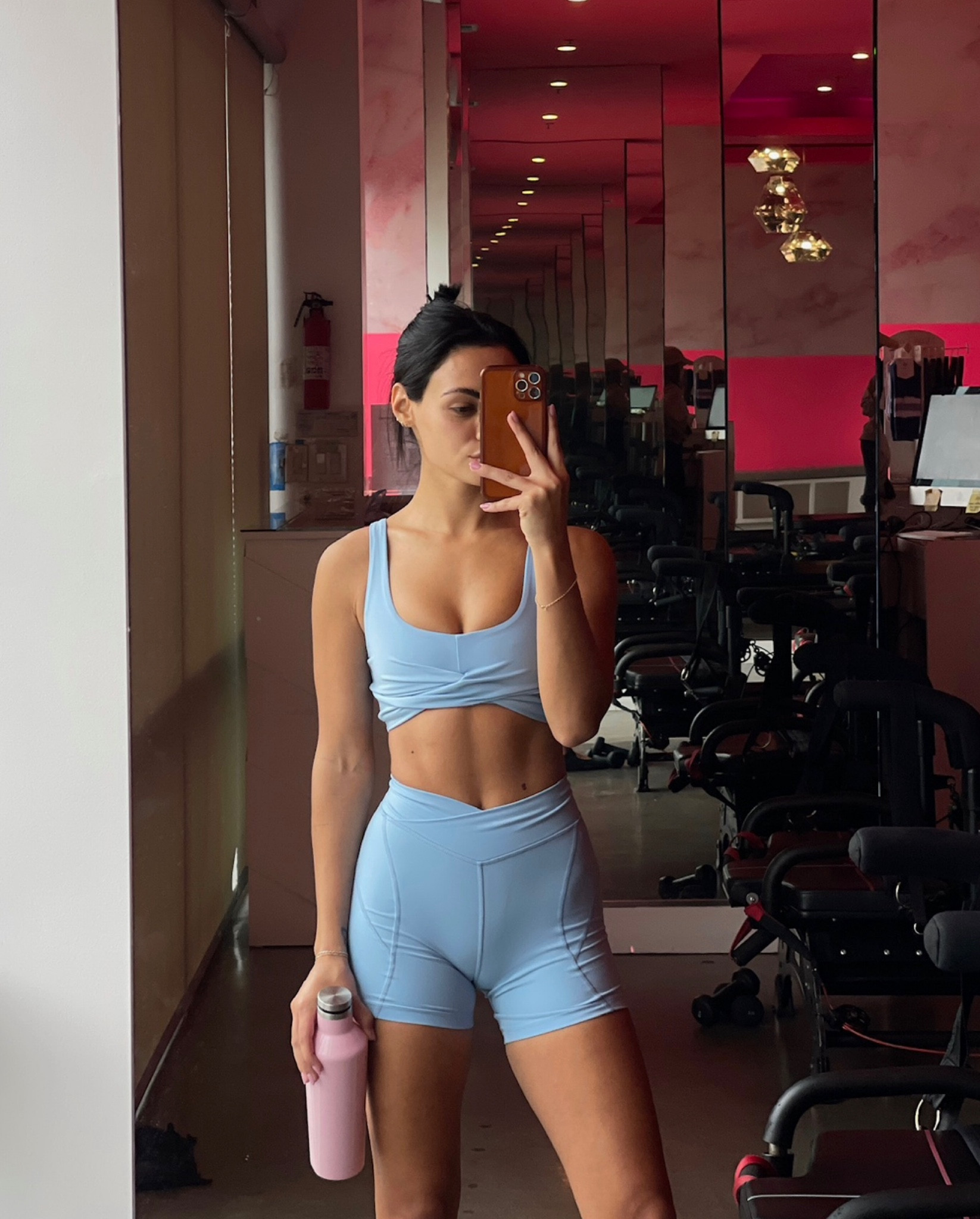 Lspace twist top and carter bike short #lspace #workoutfit 

#LTKSeasonal #LTKfit #LTKstyletip