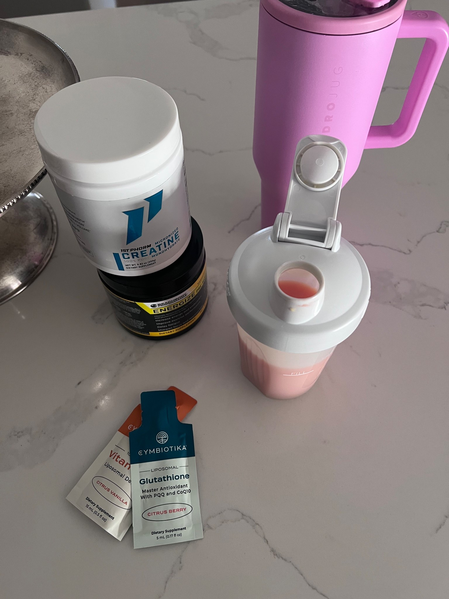 My favorite pre workout & the best shaker are on Amazon now! 

AM Routine: Water, Glutathione (favorite supplement!), Vitamin C, 
then Preworkout + Creatine. 

Recommend buying Cymbiotika at your local sprouts much cheaper and can pick up one at a time to sample it. 

Creatine is great for workouts but specifically the brain health it does for women 

#LTKBeauty #LTKActive #LTKTravel