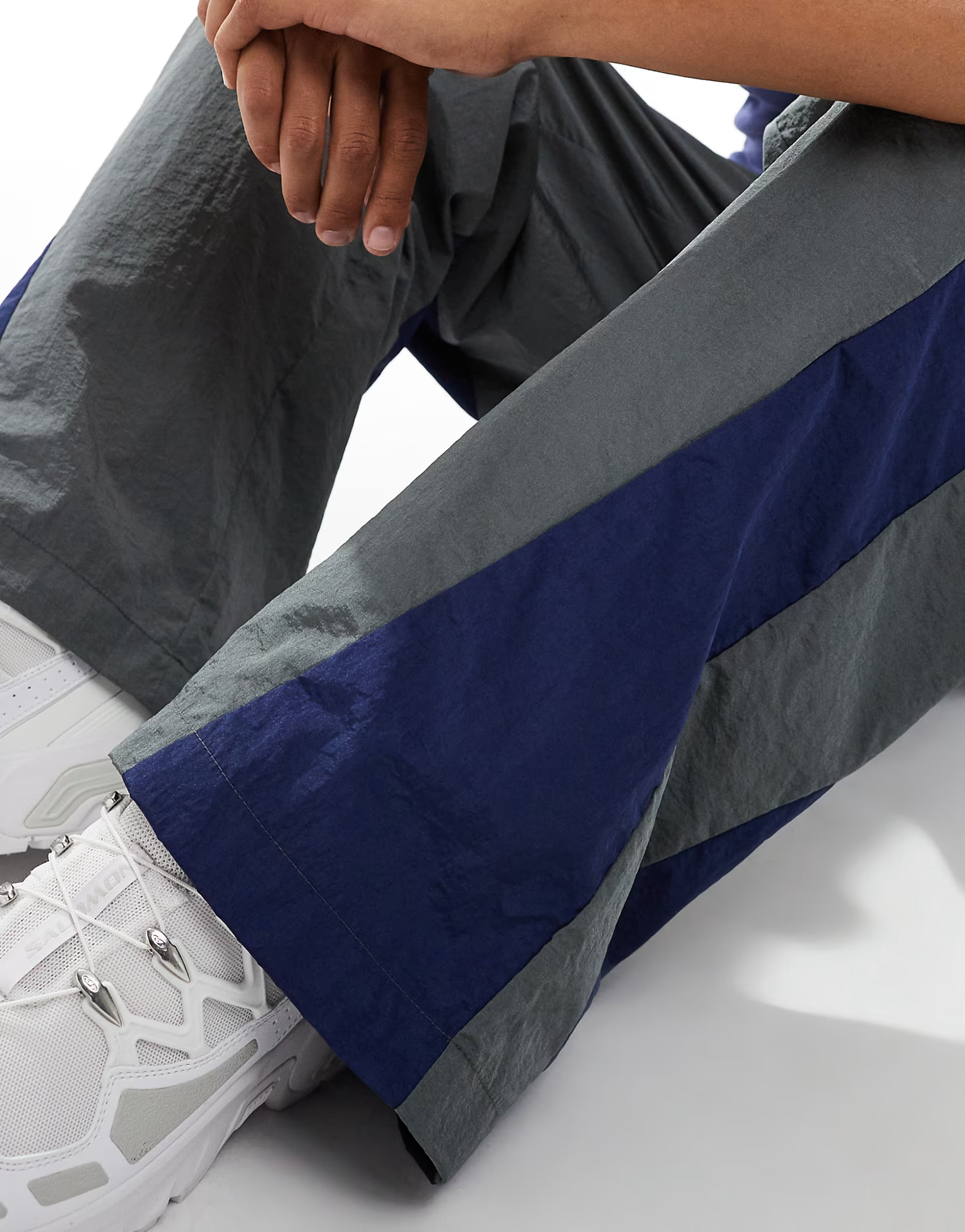 ASOS DESIGN baggy nylon track pants in gray with blue panels | ASOS | ASOS (Global)