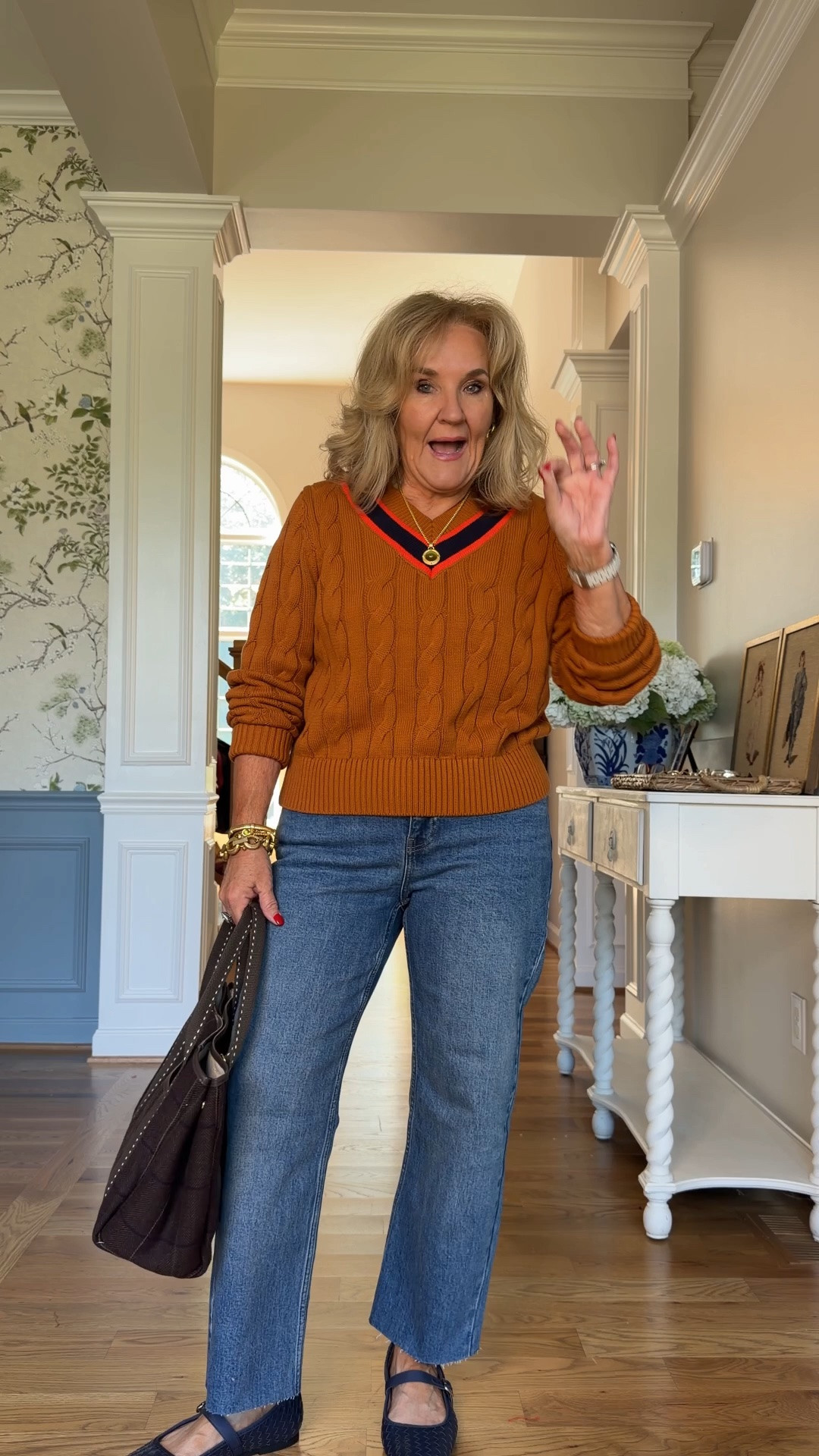 I sized up in the sweater to a large it comes in four colors, but this is the only one that has that tennis sweater trim detail
The jeans are a stovepipe jeans. Everyone needs a straight silhouette in their closet and this is a really good affordable option. I did cut about 4 inches off the bottom.

#LTKOver40 #LTKootd #LTKPetite