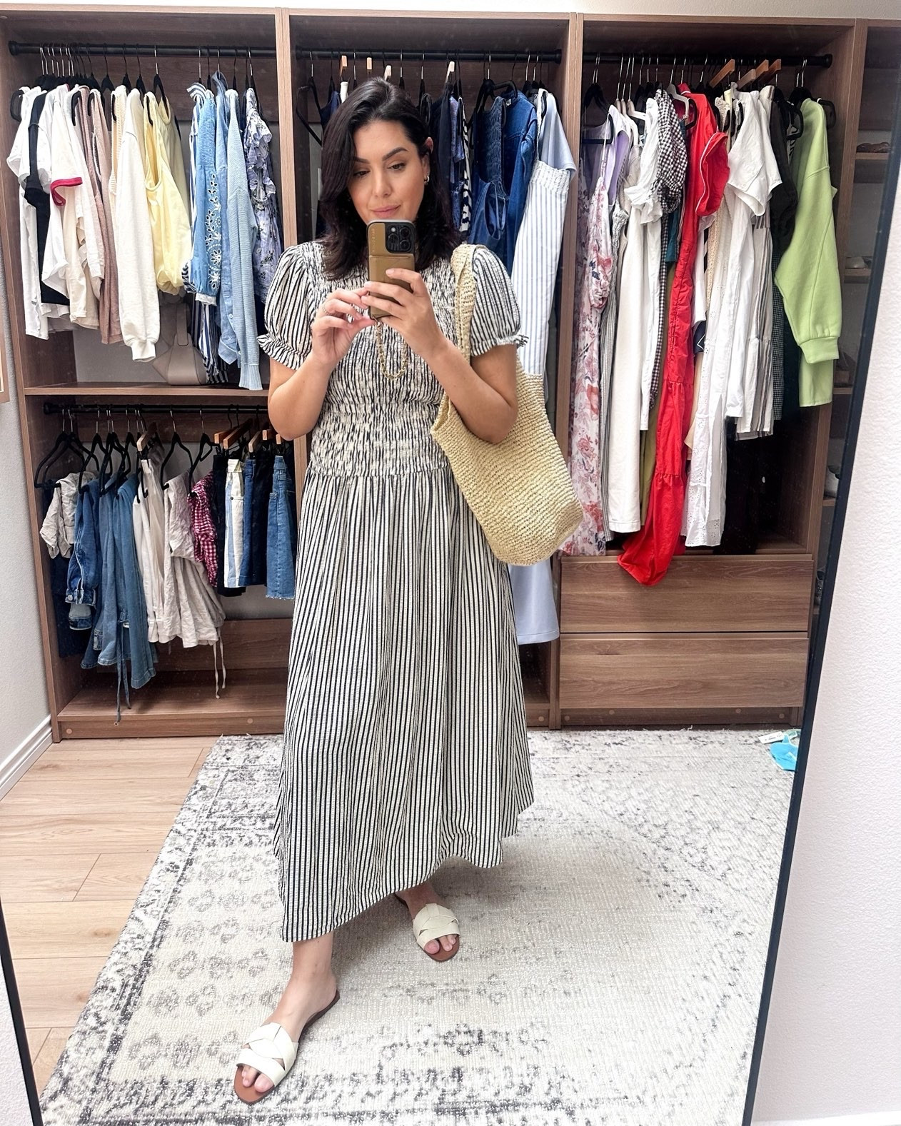 Such a comfortable dress! I wasn’t sure with the smocking in the torso but it’s actually flattering and doesn’t accentuate a tummy. I’m in the large, true to size for me!