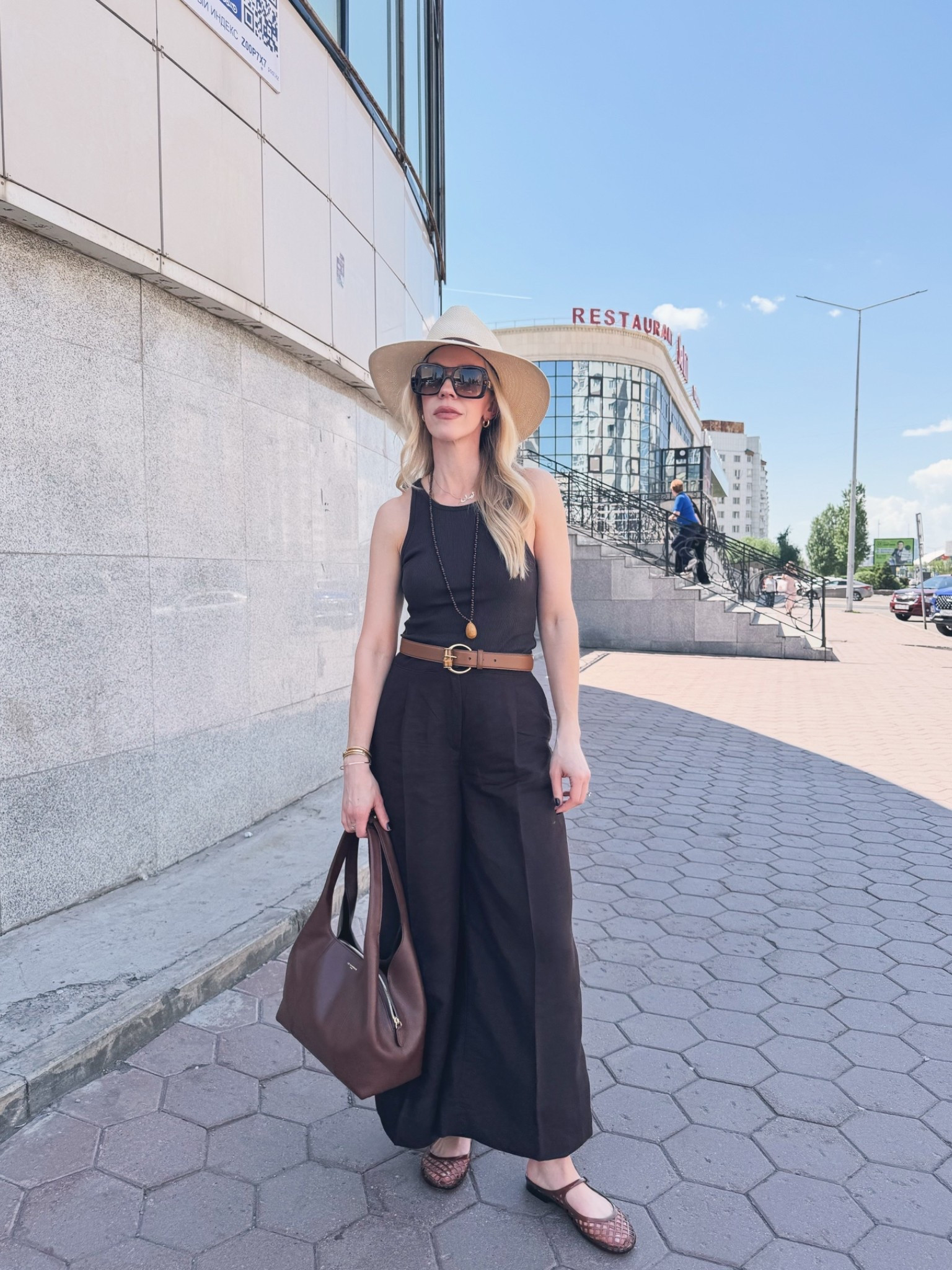 Dark brown summer vacation outfit with cropped linen pants, jelly shoes, and straw hat

#LTKTravel #LTKSeasonal #LTKOver40