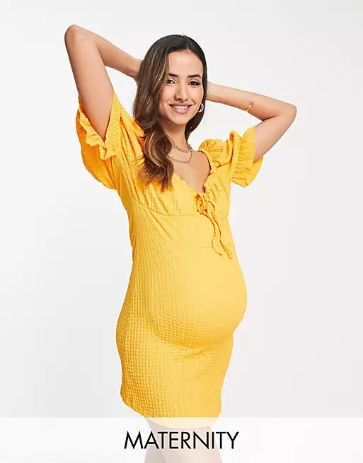 Wednesday's Girl Maternity puff sleeve mini tea dress in textured orange | ASOS (Global)