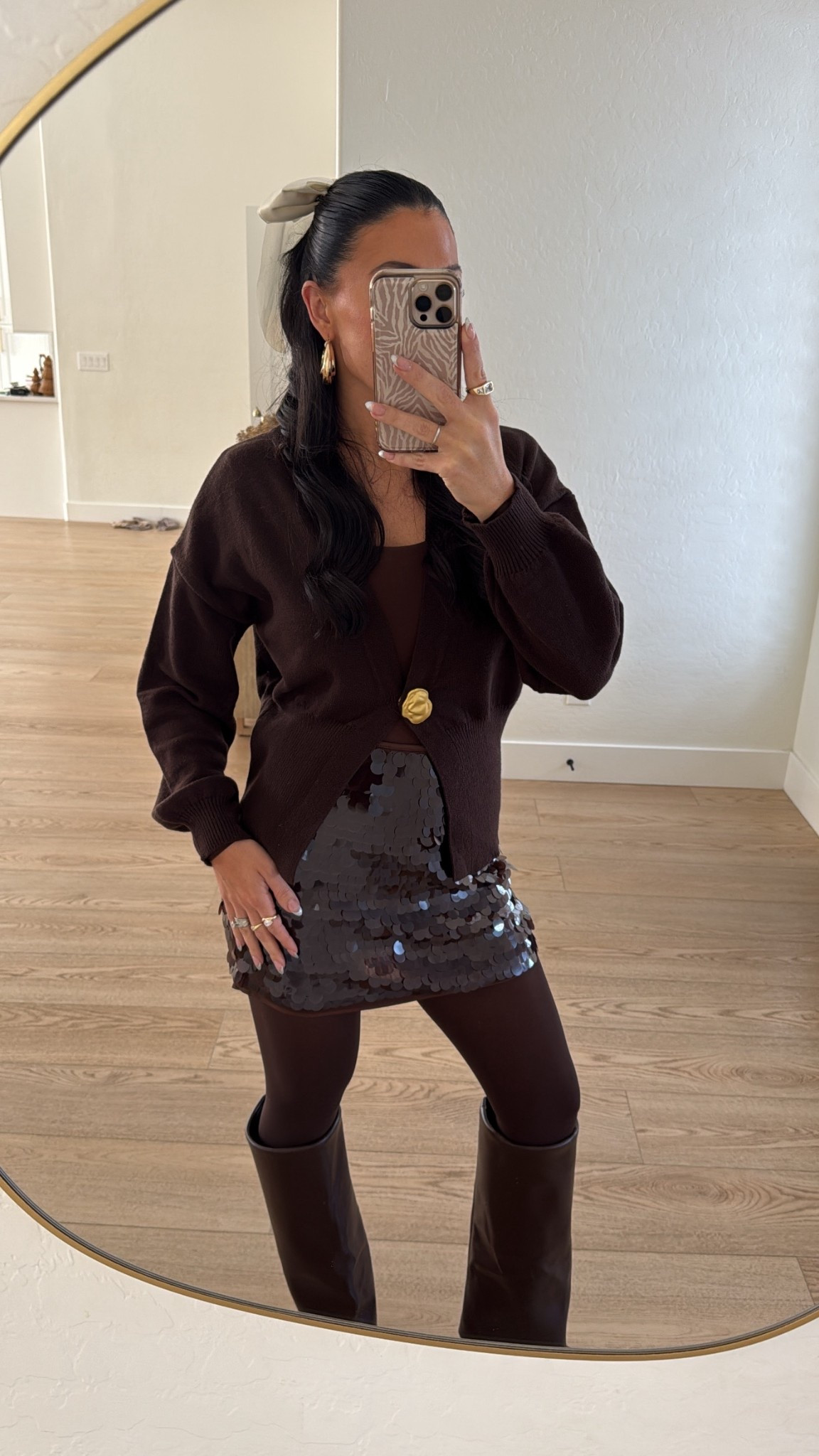 Cardigan or no cardigan?? Looking like a chocolate bar tonight haha
Cupshe cardigan size small
Aerie bodysuit 
Abercrombie skort 
Amazon tights
Foldover boots 


#LTKHoliday #LTKgrwm #LTKootd