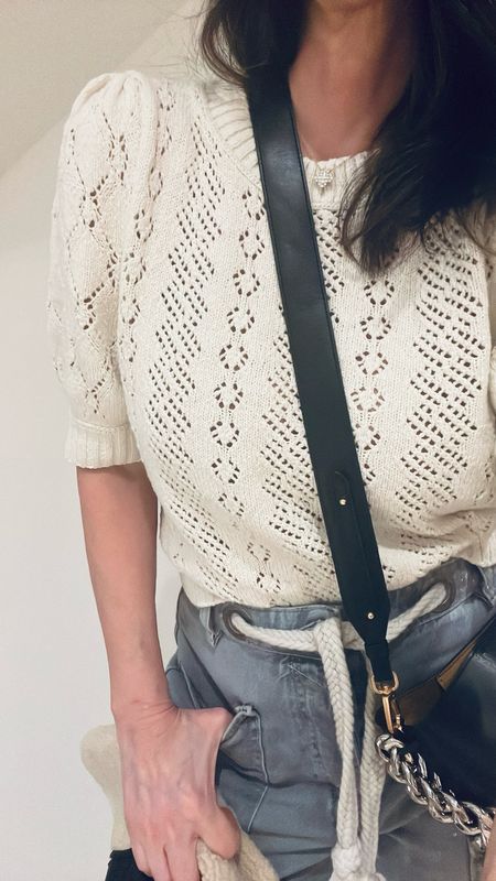 New puff sleeve pointelle sweater by free people is budget friendly and sooooo cute!! Runs slightly large thru shoulders and bust, I’m wearing size small 
Also wearing FP Splatter paint barrel leg jeans 

#LTKstyletip #LTKMostLoved #LTKfindsunder100