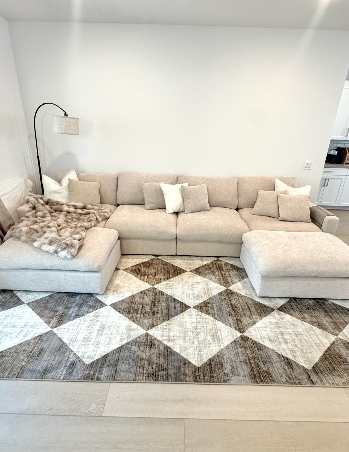 the neutral rug and couch of my dreams ☁️🤩🤎

wanting my living room to be warm, cozy and inviting, and I feel like I achieved that with this cloud couch dupe and area rug combo! 

both are in crazy sale today!🫶🏼

#livingroomdecor  #neutralhome  #cloudcouchdupe  #cloudcouch  
 #couch  

Cloud couch dupe, affordable cloud couch, living room decor, neautral living room, cloud couch sectional, comfy couch

#LTKHome #LTKSaleAlert