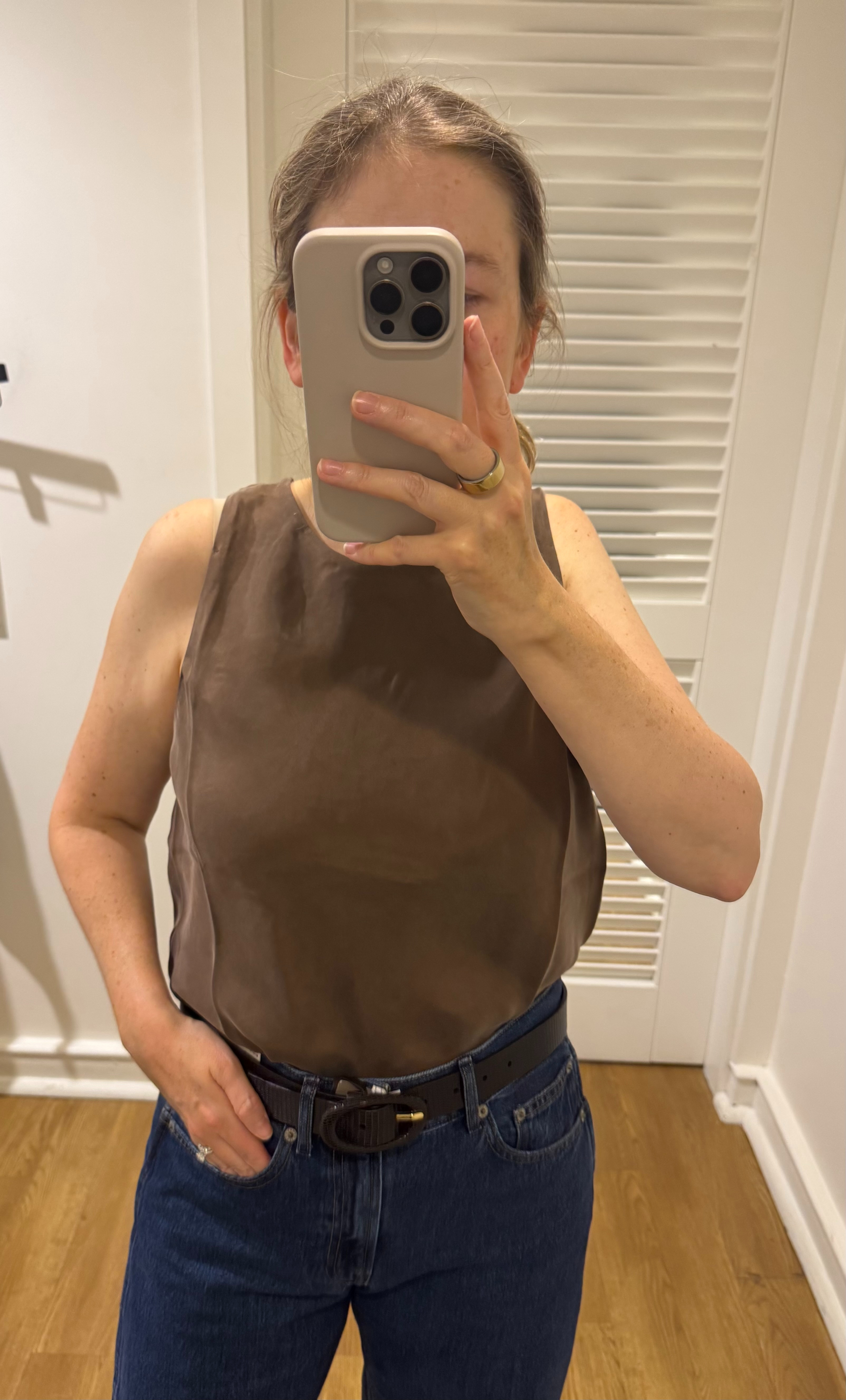 Love this top in this color! I ended up buying it in navy for something different, but each of the colors (there's also pink and black) is a good option for versatility. I recently wore it on a travel day, and it's perfect for work or a casual denim outfit too. 

 #LTKmomlife #LTKWorkwear #LTKTravel