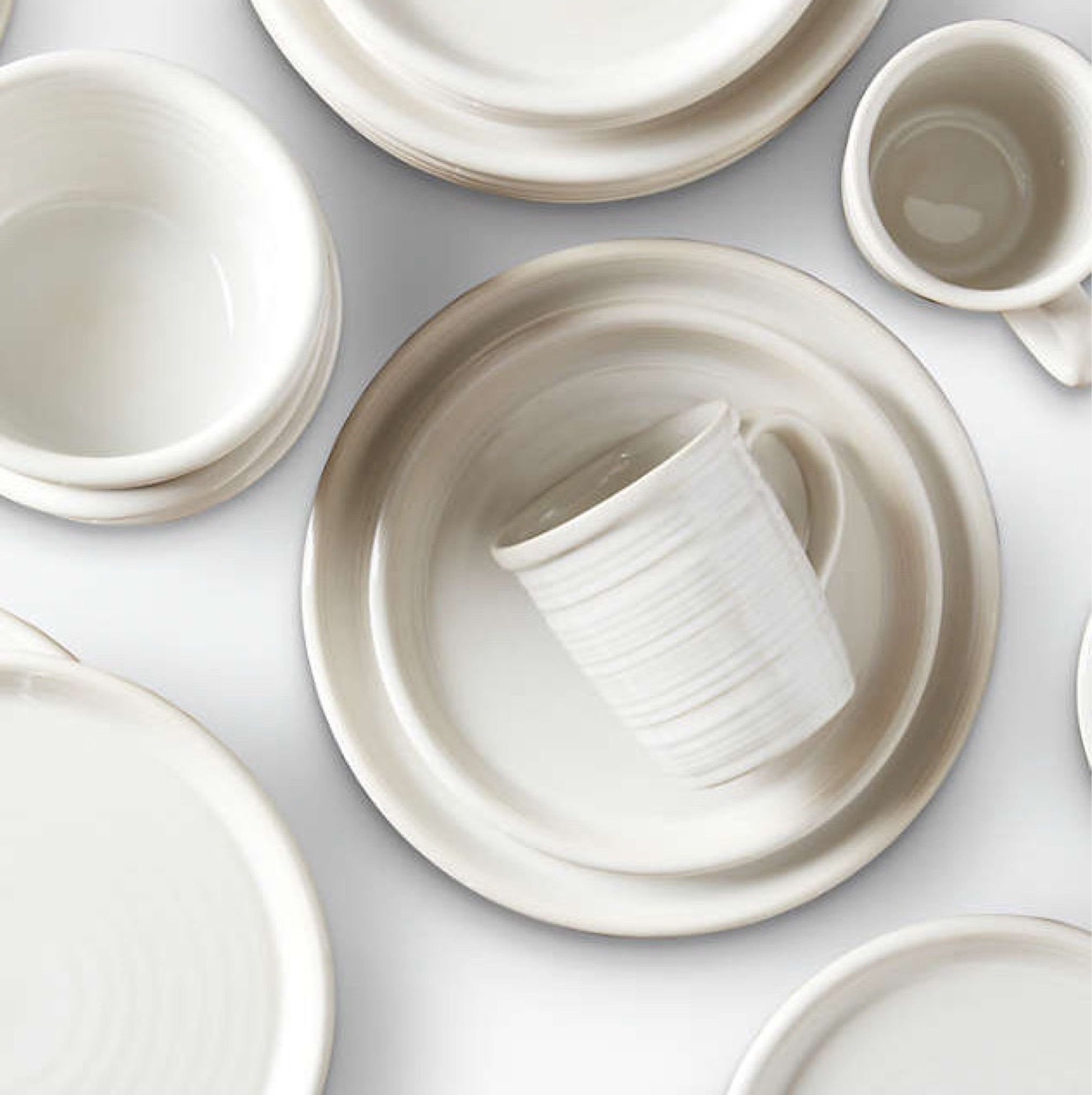 Our classic white ceramic dinnerware, mugs, and bowls from Crate & Barrel 


#weddingregistry #weddingpresent #dinnerware #mugs #plates #timelesshomedecor #classy #kitchenmusthaves

#LTKFind #LTKhome #LTKfamily