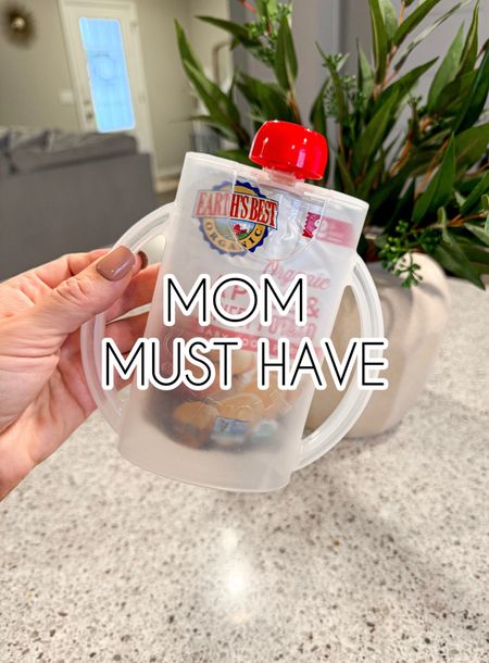This is a must have for moms with babies or toddlers who eat pouches! This holder makes it easy to eat a pouch without squeezing it all out! It has handles and can hold a pouch with the cap on to store in the fridge.

#LTKfamily #LTKbaby #LTKkids