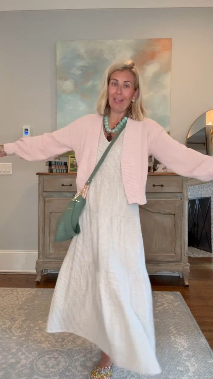 Oh wow I love this dress! It’s the perfect throw on and go dress. I’m in xs dress & cardigan and 7 bling sandal (size 1 down).

#LTKootd #LTKmomlife #LTKOver40