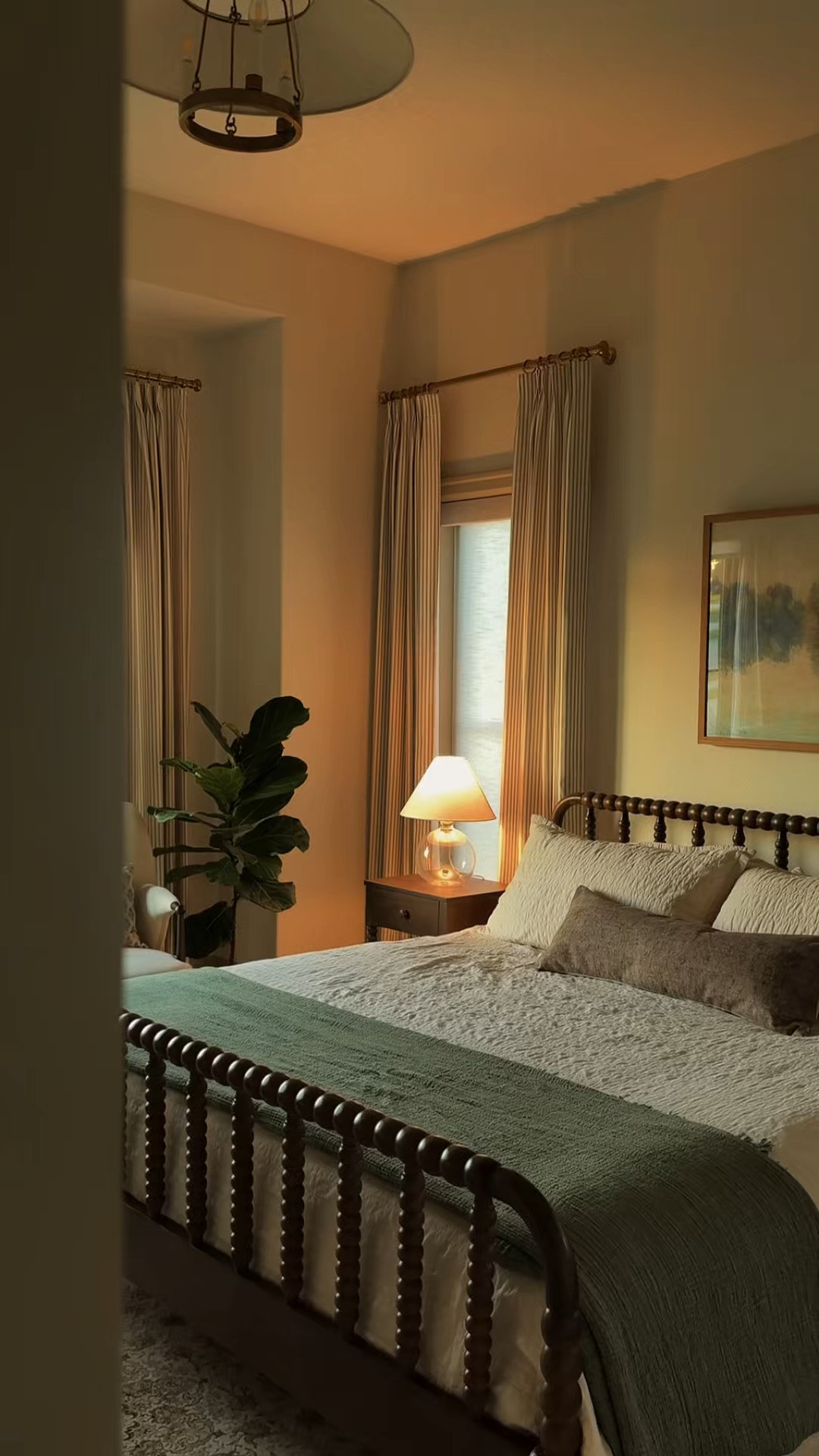 A timeless bedside lamp with the warmest glow🤎 the dandelion bowl table lamp from Birch Lane ￼ bring such a cozy feel to our guest bedroom. I love how the clear glass base makes it easy to style on the linen blend shade softens the light.