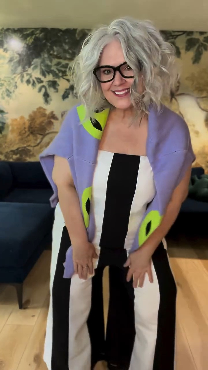 Why am I loving alien 👽 everything, lol, anyway, this little cotton/linen blend wide leg striped jumpsuit is so much fun, I can’t wait to style it for work I’m wearing a Large and I’m a size 16. It runs big. 
 💚💜💚💜 I’m prepping for fall with this sweater but I just loved it with the stripes. And I got it on sale!!! 

#fashion #over50fashion #midsizefashion #OOTD #over50style

#LTKOver40 #LTKMidsize #LTKWorkwear