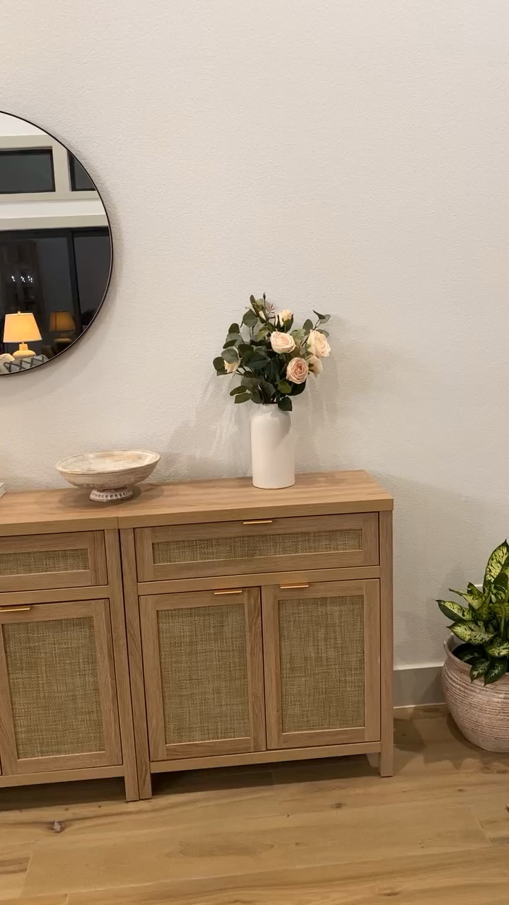 Entryway cabinet or console table. Decorated with table lamp, vase, stems, decor books, decorative bowl  

#LTKHome #LTKVideo