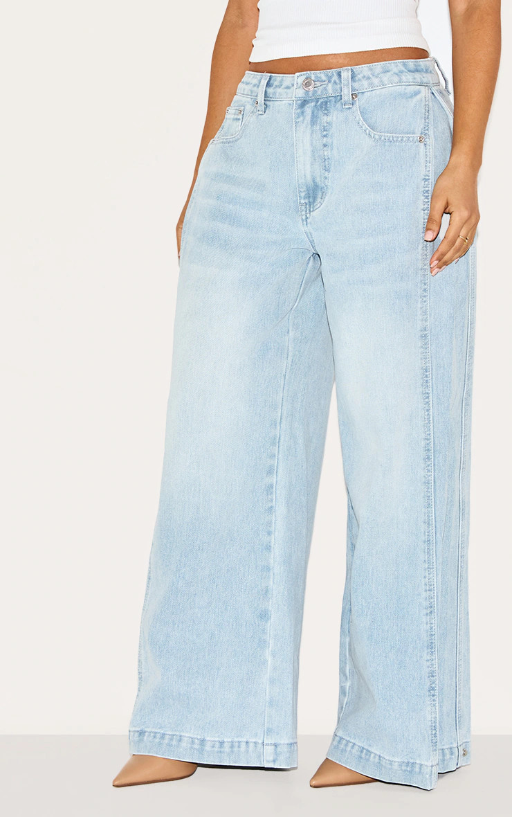 Petite Light Blue Denim Side Pleated Detail Wide Leg Jeans | PrettyLittleThing US