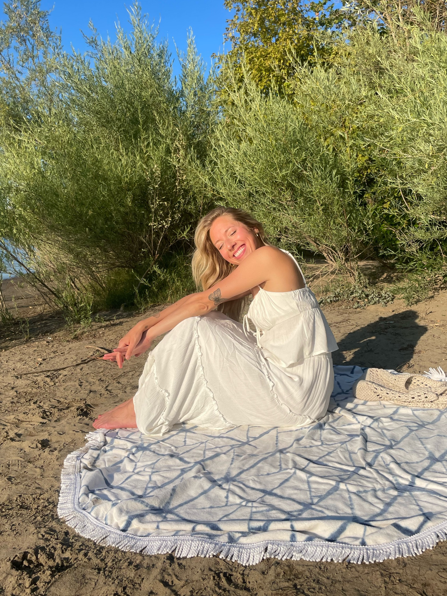 Golden hour glowing 🌞✨ There’s just something about an all white outfit at sunset at the river that makes me feel like a little fairy! Like I’ve said - this white flowy skirt is probably the most worn piece in my closet 🙈

#LTKSeasonal #LTKSummerSales #LTKFindsUnder50