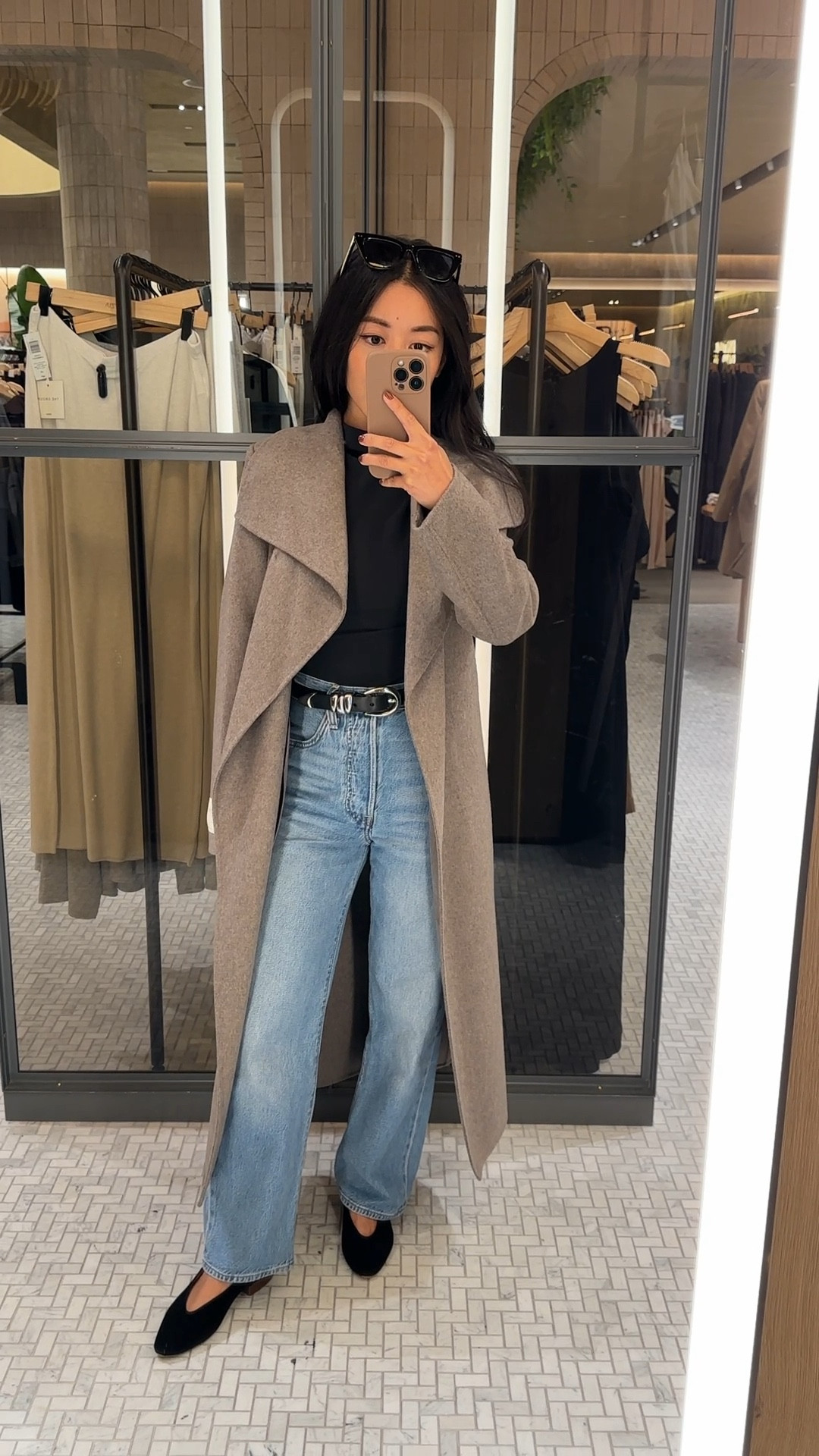 Tried this on last week and keep thinking about it! Comes in other beautiful neutral colors like charcoal gray and camel. 

• size xxs, Double faced elegant taupe wool blend wrap style coat with a long midi length. I’m 5 feet tall for reference.

Collar is a more oversized wider statement collar with drape to it. 

Since it’s unlined and double faced, there is beautiful movement. Not a cold day winter weight coat. 

• Levi’s ribcage jeans 24 x 27 “in the middle”

• black mockneck

• sezane flats 35 with heel lift added so my ankles don’t rub. Fairly cushioned 

• Madewell belt xxs 

Aritzia Babaton try on, petite fall outerwear finds  

#LTKxMadewell 

#LTKStyleTip #LTKWorkwear