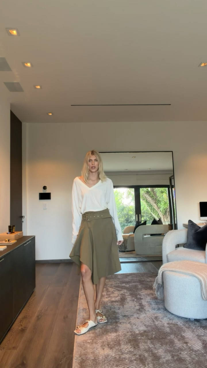Obsessed with this belted green cargo skirt! Paired with this incredibly comfortable v neck sweater & sandals. ✨🤍

#LTKSeasonal #LTKgrwm #LTKootd