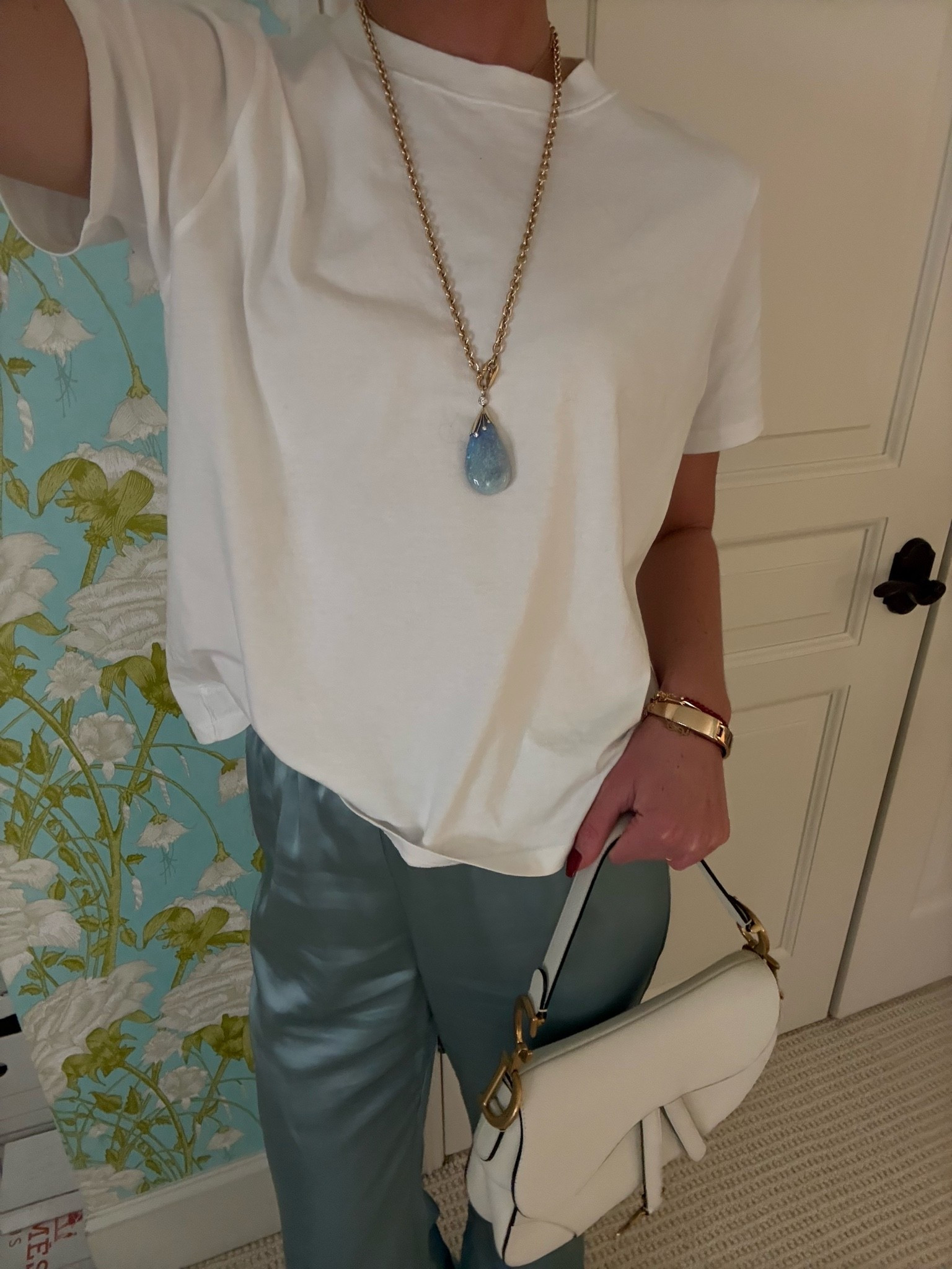Blue silk pants with white T-shirt and gold and blue necklace. Dinner outfit. Summer outfit. Vacation outfit. Outfit. Inspiration. Travel outfit. Chic outfit Ideas. Revolve finds. Colorful blue satin pants outfit

#LTKTall #LTKootd #LTKTravel