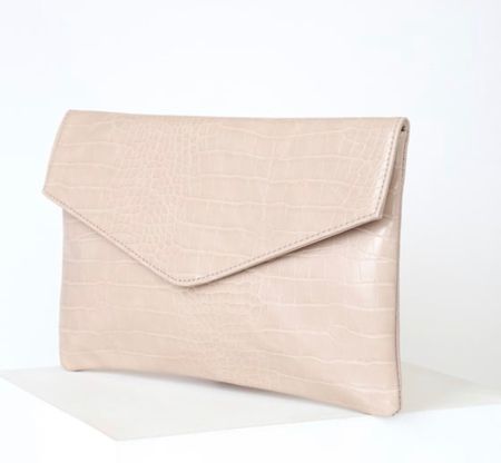 LTK FIND! Lulus.com. Nude Clutch. “Leelou Beige Crocodile Embossed Clutch”
🏷️$28

Set the trend with the Lulus Leelou Beige Crocodile Embossed Clutch! Vegan leather, embossed in a cool crocodile pattern, shapes this oversized clutch featuring a magnetic front flap that opens to a zippered top and a roomy interior with zippered side wall pocket. Carry as a clutch or attach the 46" gold chain strap.

#LTKunder50 #LTKFind #LTKitbag