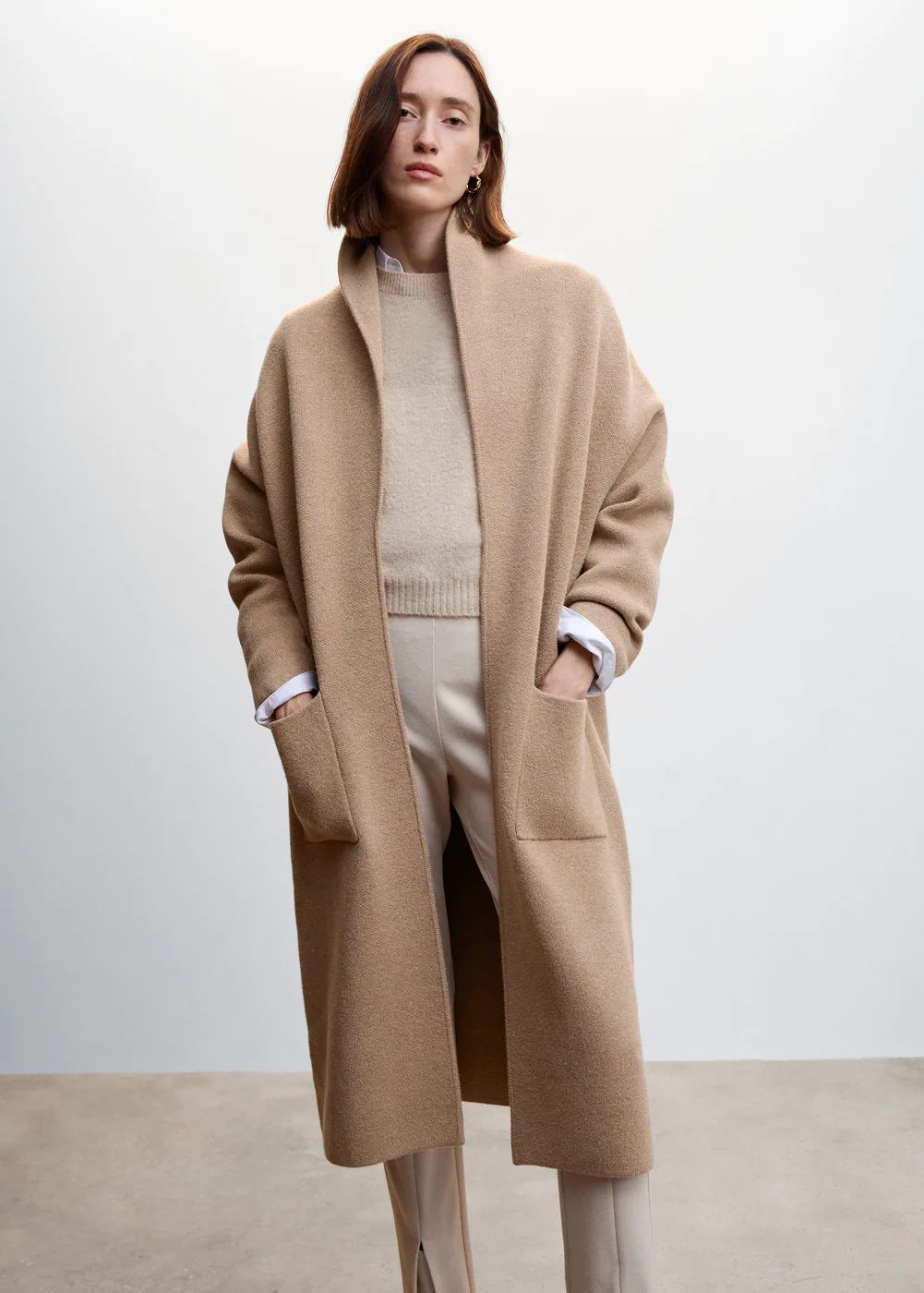 Oversized knitted coat with pockets | MANGO (UK)