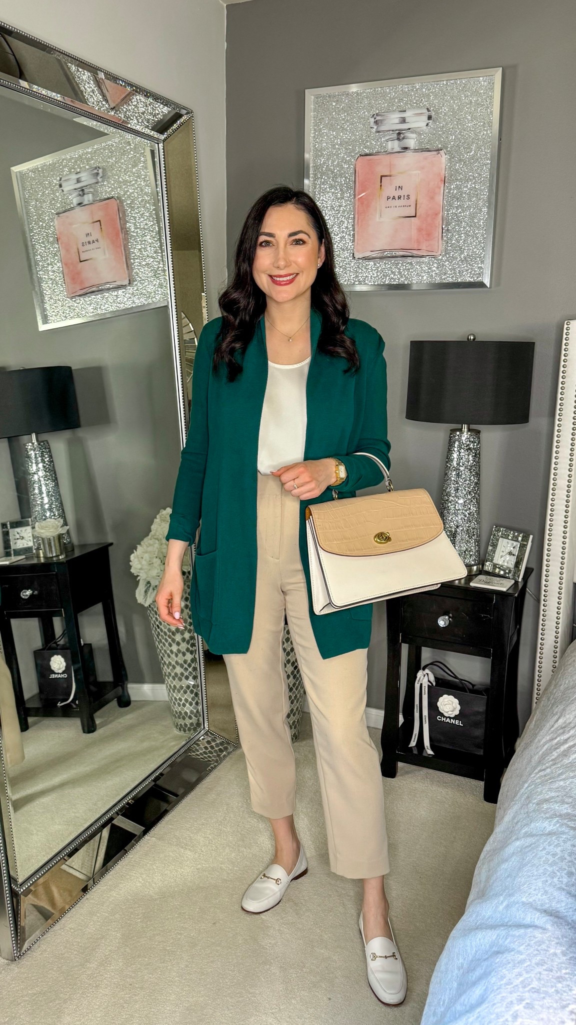 Business casual work outfit 💚

Green cardigan 
Cream tank top 
Tan pants 
White loafers 

Spring work outfit 
Work wear 
Office outfit 
Office style 

#LTKSeasonal #LTKWorkwear
