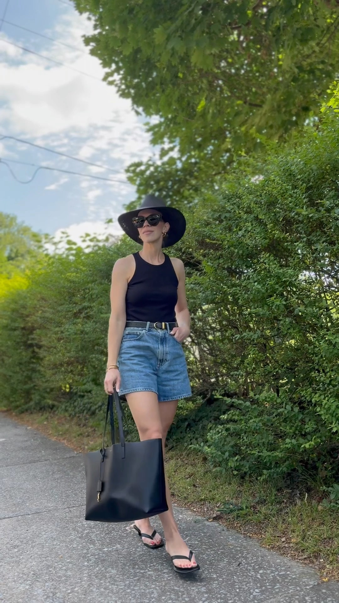 90’s minimal summer outfit, black tank with denim shorts, @Janessa Leone black straw hat, kitten heel thong sandals

#LTKSeasonal #LTKOver40 #LTKSaleAlert