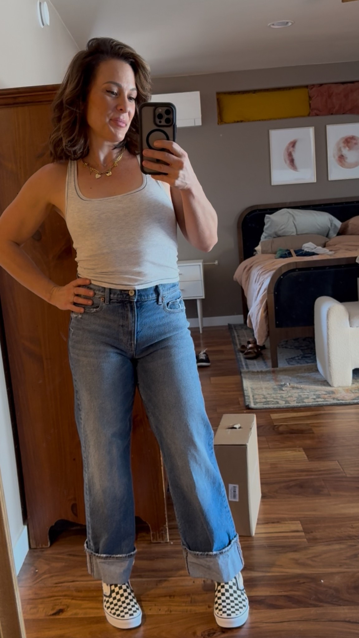 Top: size m (built in bra, so comfy!!) Fits TTS

Jeans: size 26 (mid rise and stretchy!) Fits TTS

Shoes: Vans slip ons come in wide!!  

