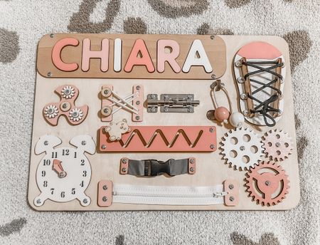 The Montessori busy board Chiara got for her 1st birthday is from Kindly toys and can’t be linked here. I did however find very similar boards and on sale! Baby Girl Gifts |  Montessori Busy Board | Activity Board Wooden Sensory Board | 1st Birthday, etsy, toddler toys

#LTKSpringSale #LTKbaby #LTKfamily