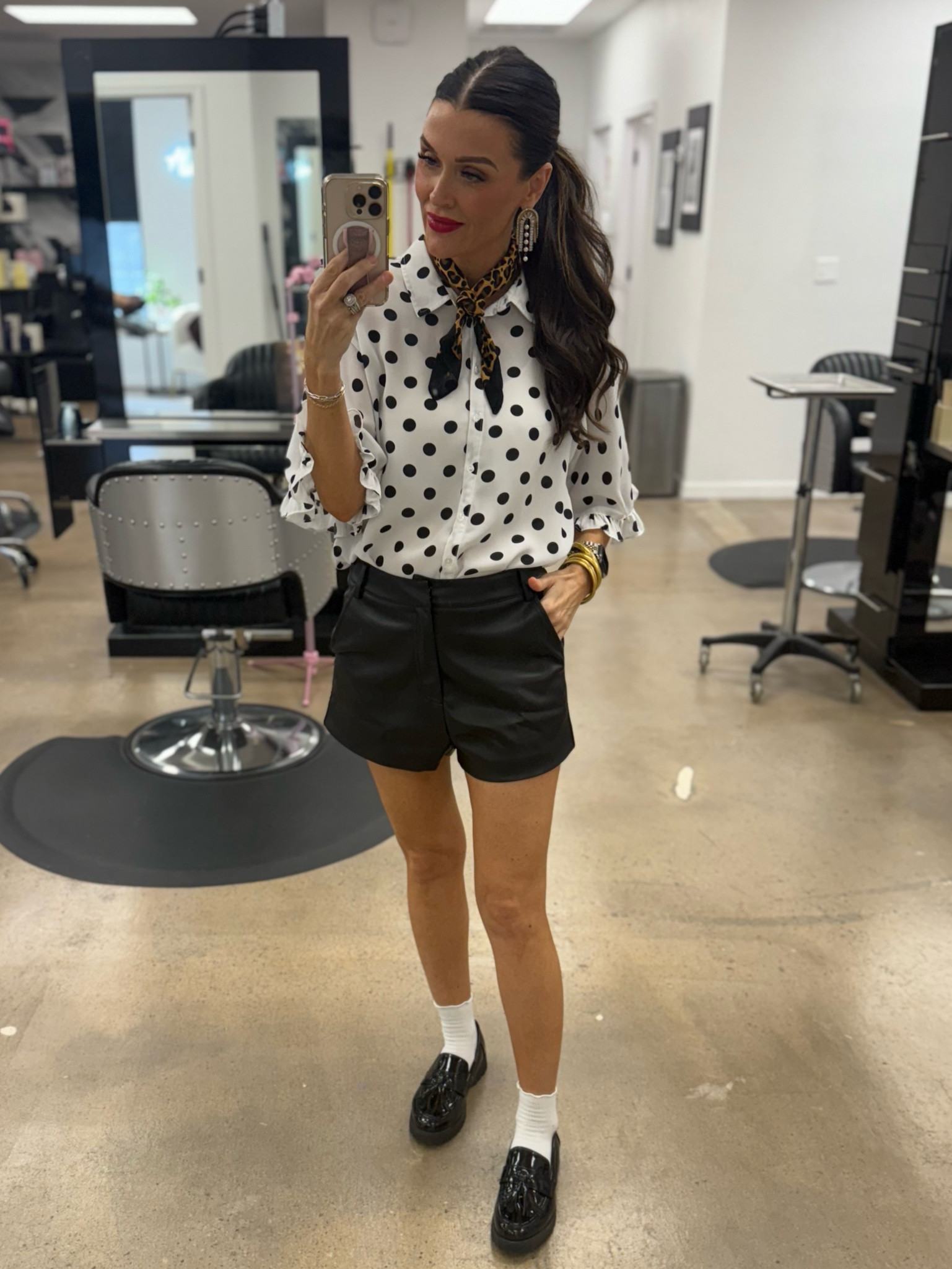 Polka dot top 
Black leather shorts
Ruffle hem socks
Black patent loafers 
Leopard neck scarf 

#LTKStyleTip #LTKFindsUnder100 #LTKFindsUnder50