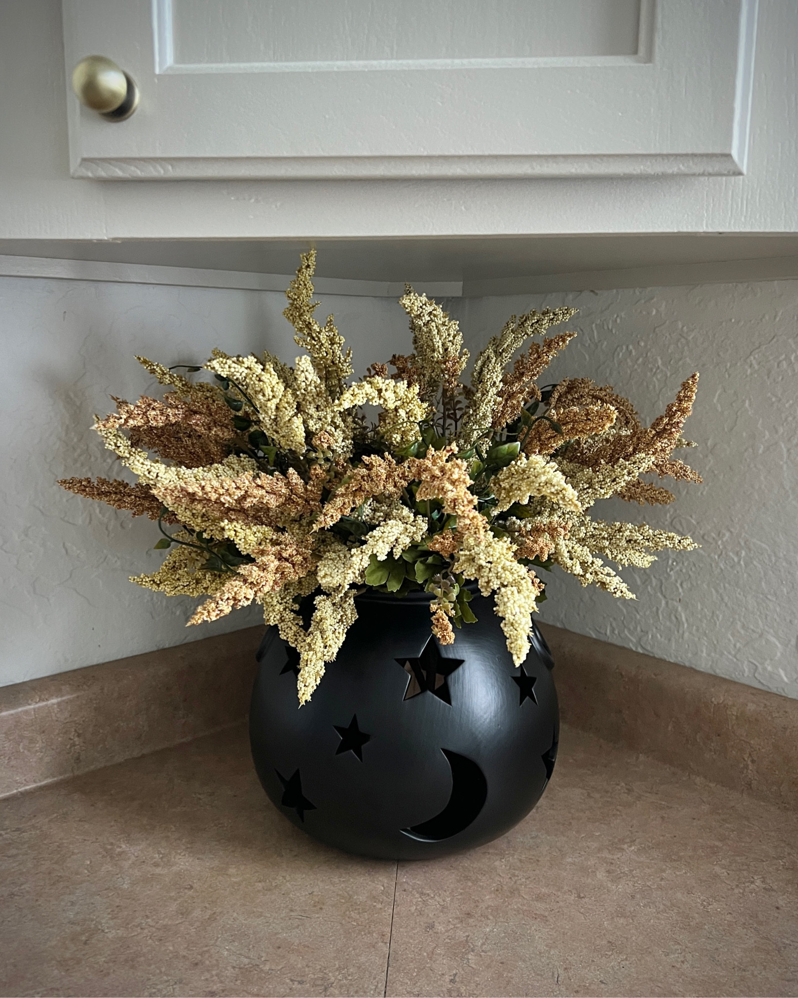 Walmart Cauldron Planter! I added a flameless candle for a spooky night time glow 👻✨ 

halloween fall autumn spooky seasonal decorations aesthetic cottage vintage neutral home decor design styling interior ideas inspo

#LTKSeasonal #LTKHalloween #LTKhome