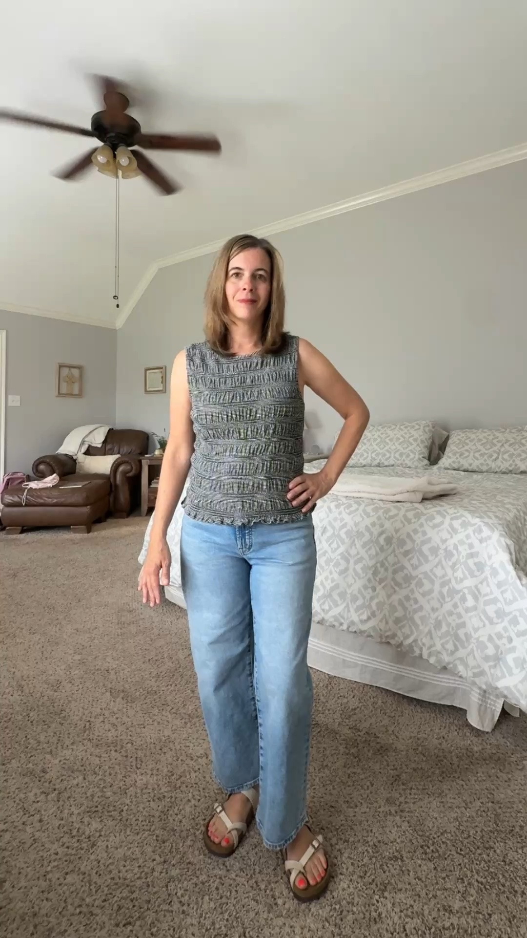 Today I’m wearing a comfort casual outfit with a sleeveless smocked top, pair of comfortable jeans, and Birkenstock sandals. These jeans come in multiple lengths. I am petite and am wearing the short length.

#LTKdayinmylife #LTKootd #LTKOver40