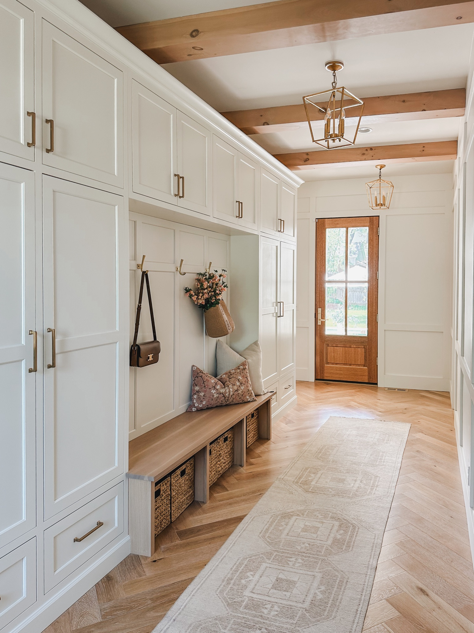 Light and bright mudroom with creamy whites, neutral wood tones, and pops of pink! 

Home finds, neutral aesthetic, mudroom details, light and bright, neutral area rug, gold detail, organization faves, Pottery Barn style, summer style, pops of pink, creamy whites, neutral wood tones, bright and airy, throw pillow, faux florals, shop the look!

#LTKSeasonal #LTKStyleTip #LTKHome
