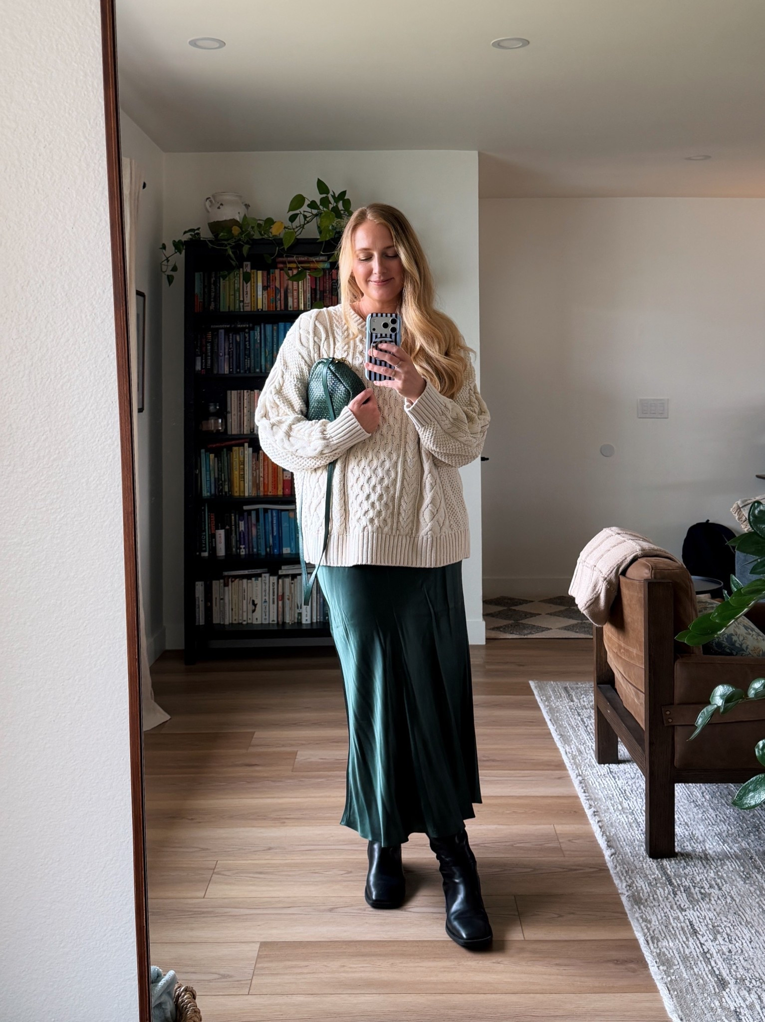 Postpartum outfit idea: I have worn this combination so many times this year! This silk skirt is so comfortable and easy to wear with a big baggy sweater over it. And I still swear by these knee-high boots from vagabond. 

#LTKmomlife #LTKValentine