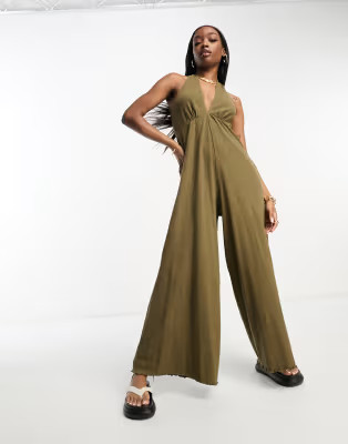 ASOS DESIGN crinkle jersey halter jumpsuit in olive | ASOS | ASOS (Global)