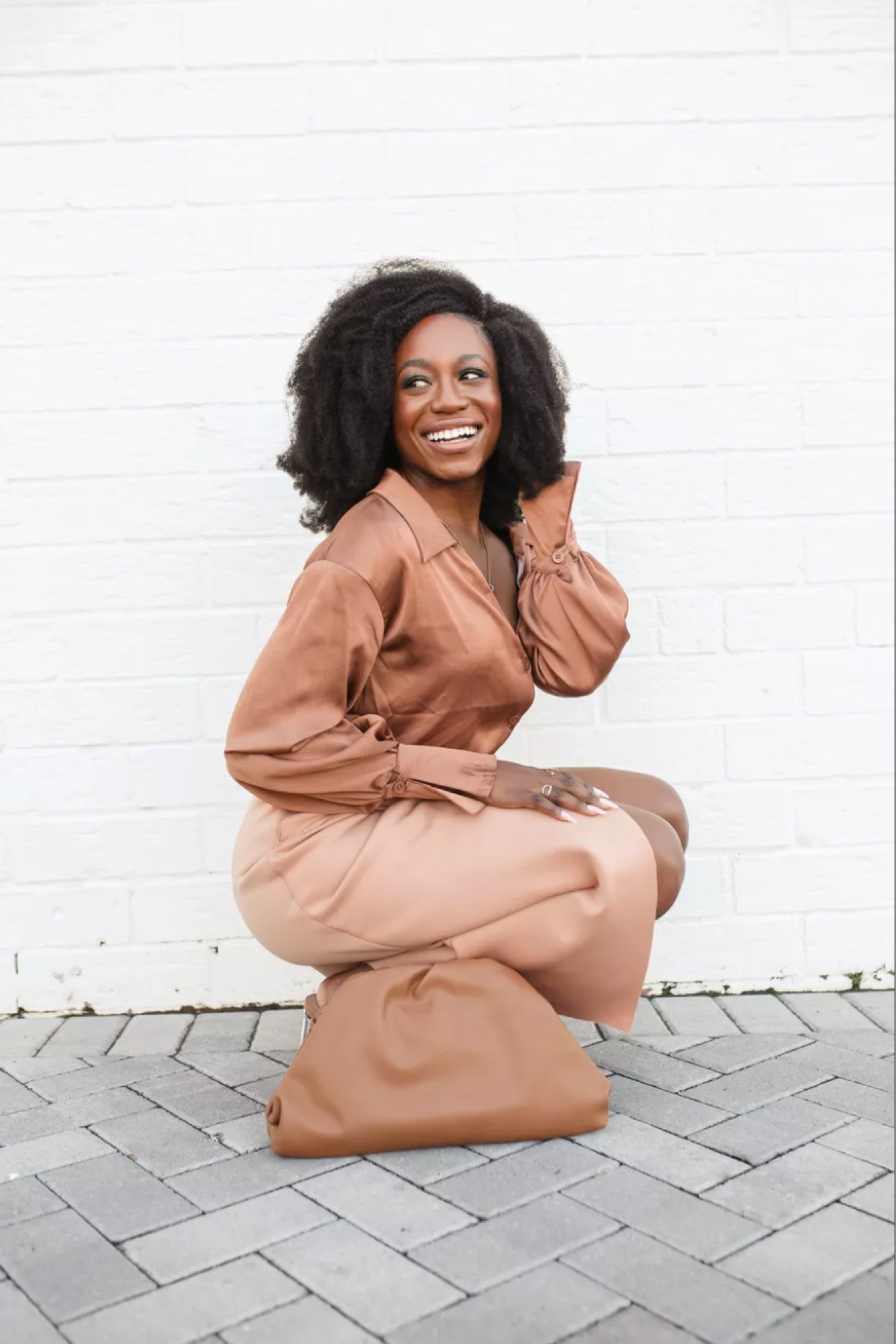Brown monochrome outfit - satin silk button down - button up tops - midi skirts - amazon bags - amazon purse 


#LTKstyletip #LTKitbag #LTKSeasonal