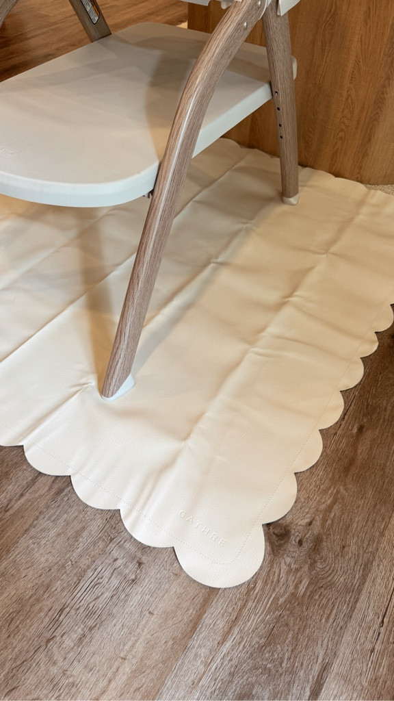 Cute scallop neutral and aesthetic high chair mat! Perfect for under a play table when she gets older! 

#LTKHome #LTKBaby #LTKFamily